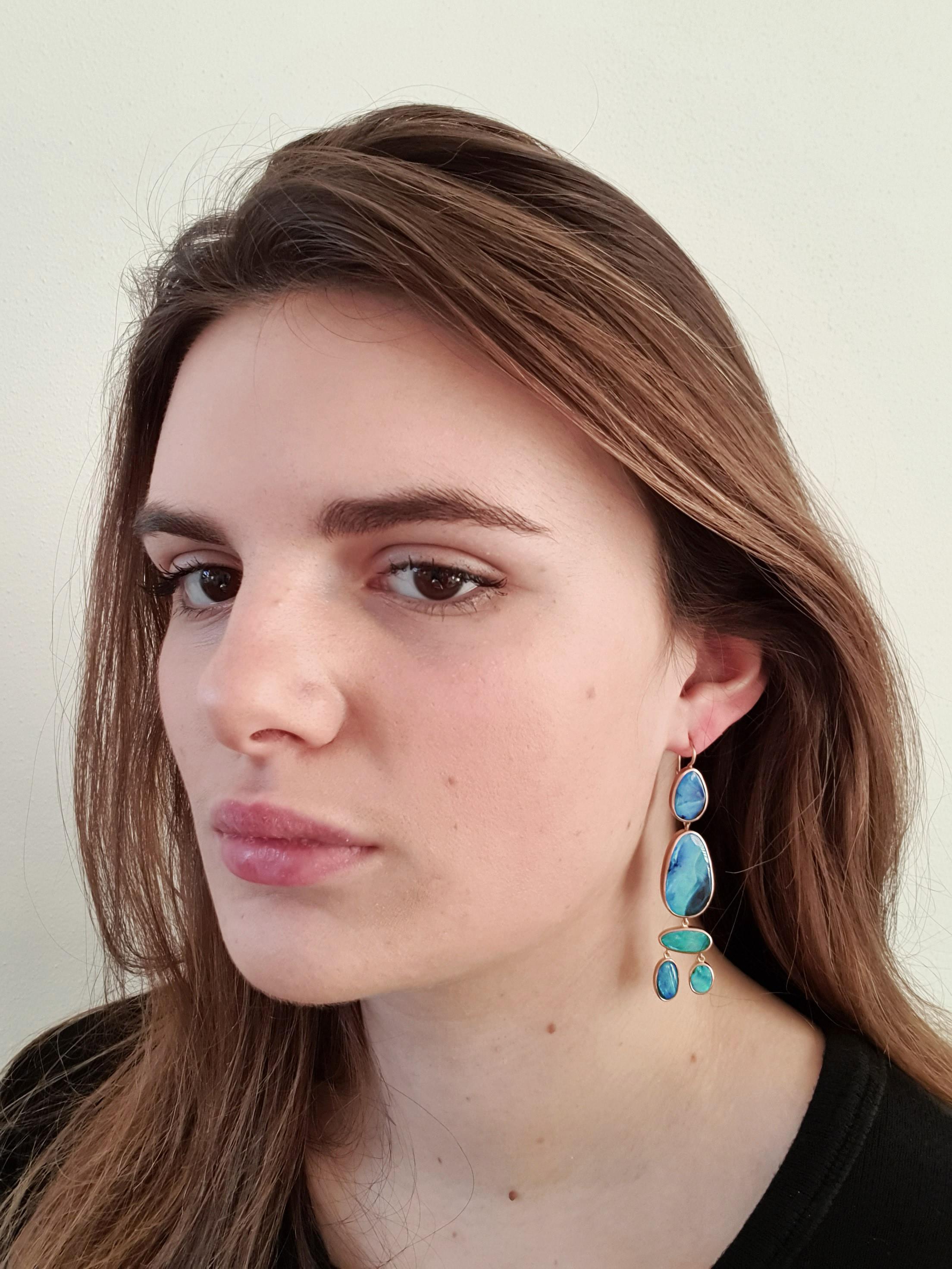 Dalben design One of a kind 18k rose gold matte finishing dangle earrings with 10  light blue bezel set Australian Boulder Opals weighing 28,30 carats.  
max width 14,60 mm 
height without leverback 64 mm
height with leverback 70 mm  
The earrings