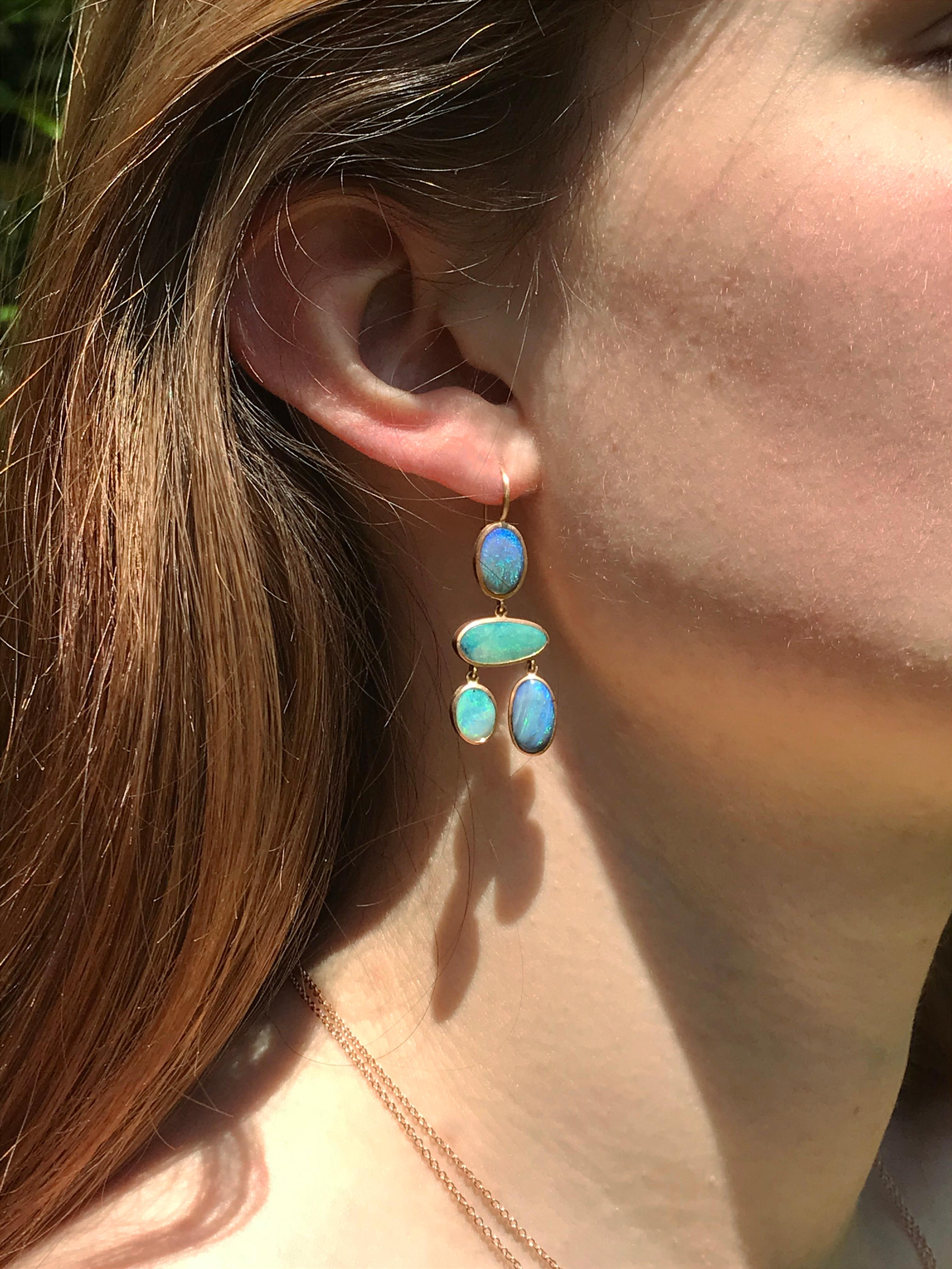 Dalben design One of a kind 18k rose gold matte finishing dangle earrings with 8 light blue bezel set Australian Boulder Opals weighing 12 carats.  
max width 16 mm 
height without leverback 34 mm
height with leverback 42 mm  
The earrings has been
