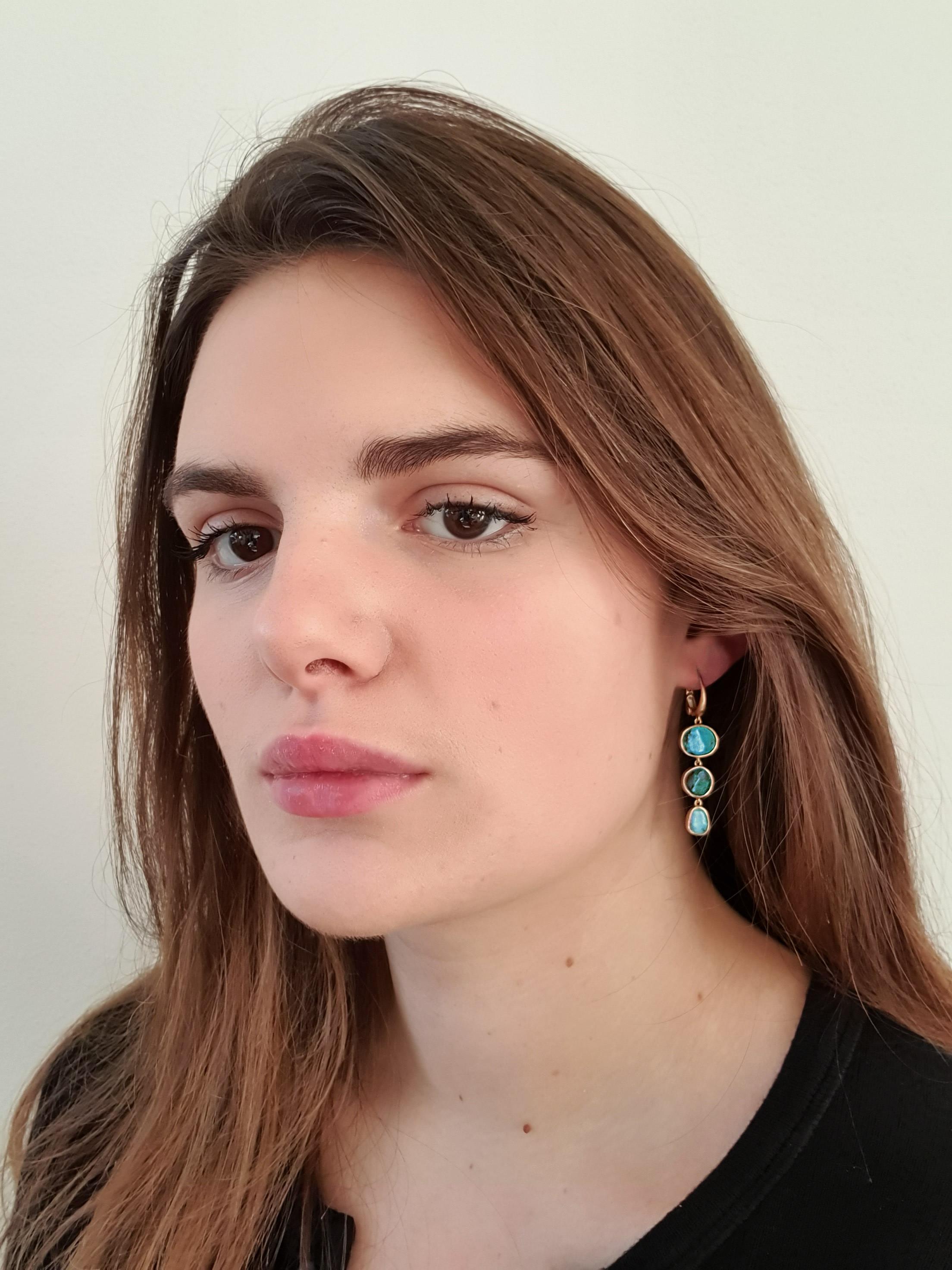 Dalben design One of a kind 18k yellow gold semi lucid finishing dangle earrings with six blue - green bezel set Australian Boulder Opals weighing 9,6 carats.  
max width 11-12 mm 
height without leverback 32 mm
height with leverback 47 mm  
The