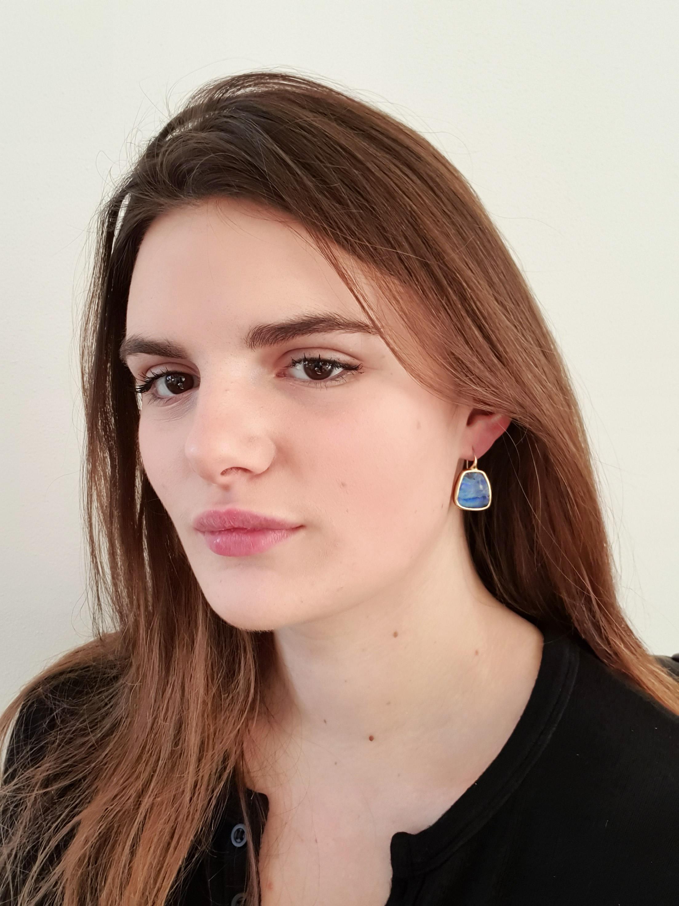 Dalben design One of a kind 18k yellow gold semi lucid finishing earrings with two blue bezel set Australian Boulder Opals weighing 18,7 carats.  
Dimension: width 18 mm height without leverback 19 mm  
The earrings has been designed and handcrafted