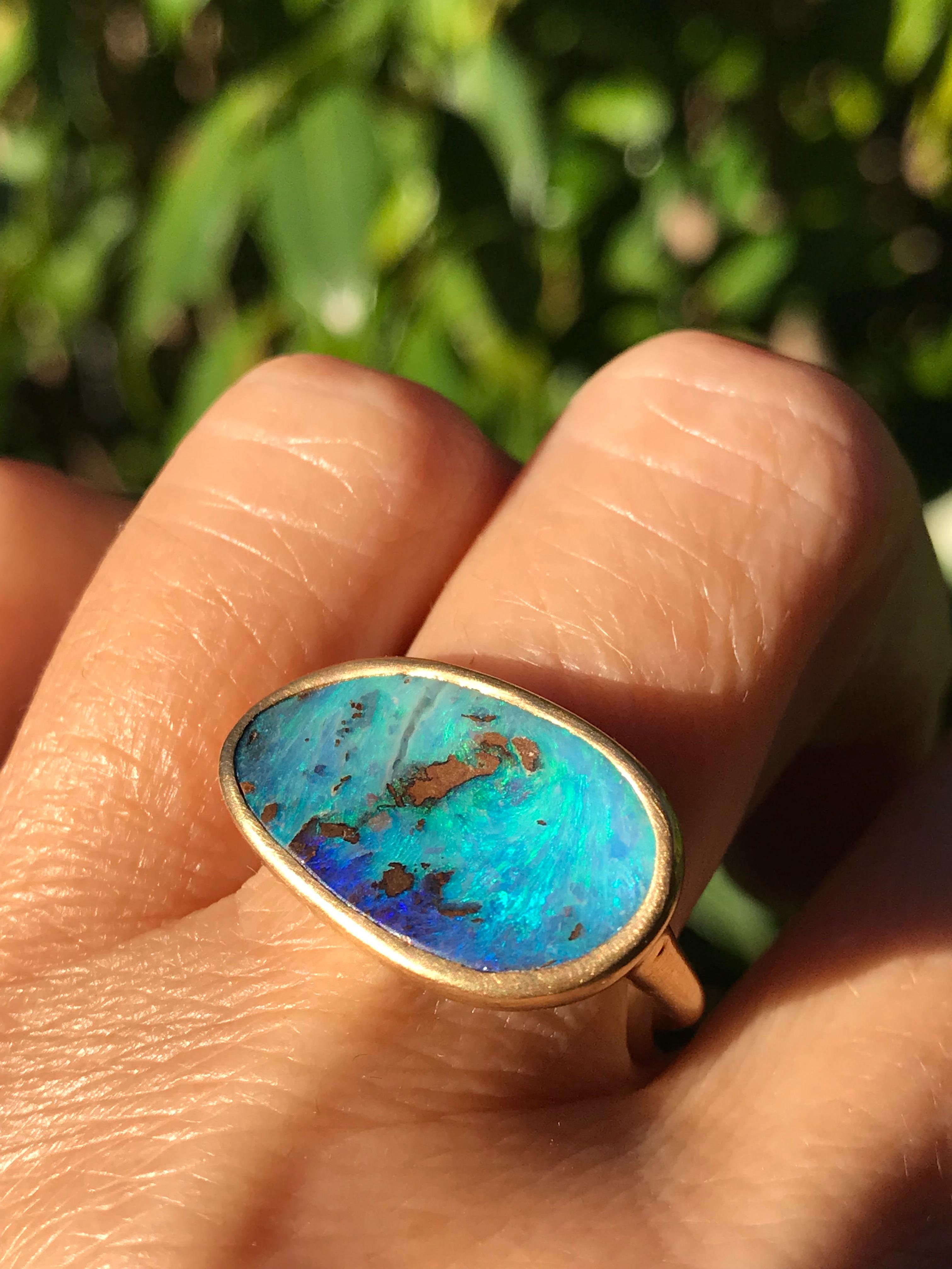 Dalben design One of a kind 18 kt yellow gold matte finishing ring with a 6,5 carat bezel-set azure Australian Boulder Opal .  
The stone sea bed color is azure and blue with some part of brown matrix.
Ring size 7 - EU 55 re-sizable to most finger