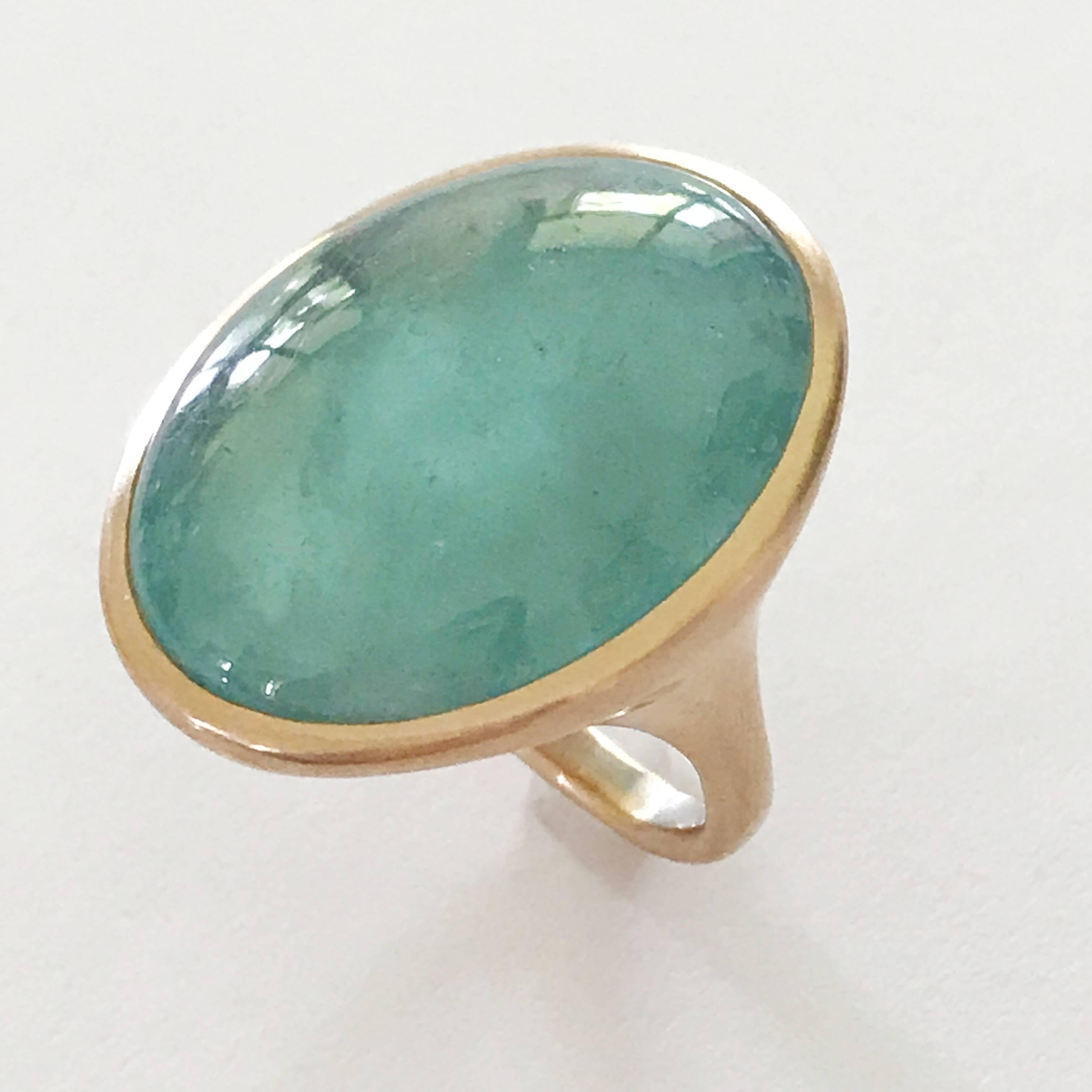 Dalben design One of a Kind 18k rose gold matte finishing ring with a 27,6 carat bezel-set oval cabochon cut Aquamarine. 
Ring size 6 3/4 - EU 54 re-sizable to most finger sizes.  
Bezel stone dimensions :  
width 22,8 mm  
height 27,1 mm  
The ring