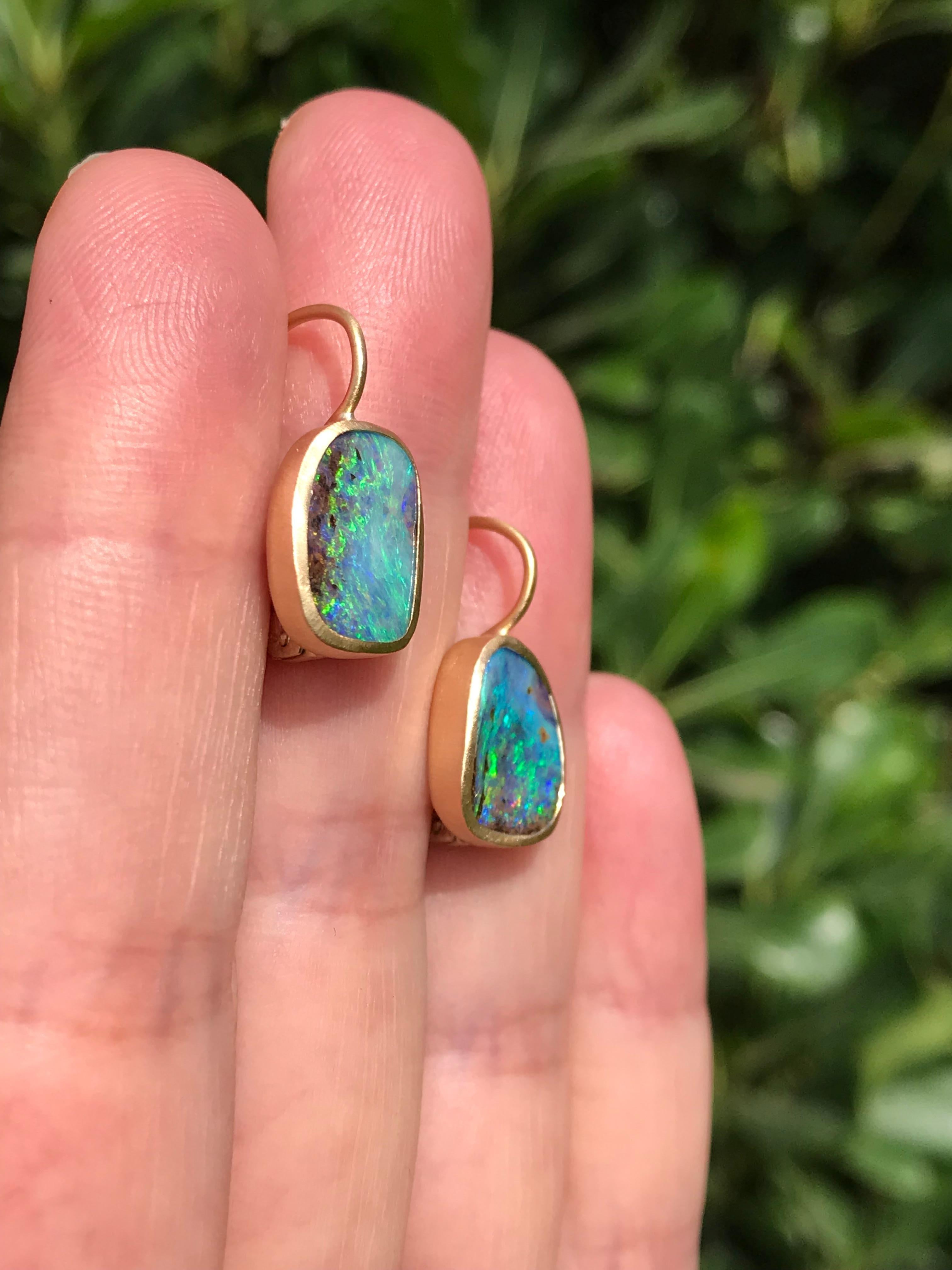 Dalben design  18k yellow gold satin finishing  earrings with two bezel-set  blue Australian solid boulder opals weight 4,9 carats . 
Bezel stone dimensions :
max width 10,3 mm
height without leverback 13 mm
height with leverback 20,4 mm
The