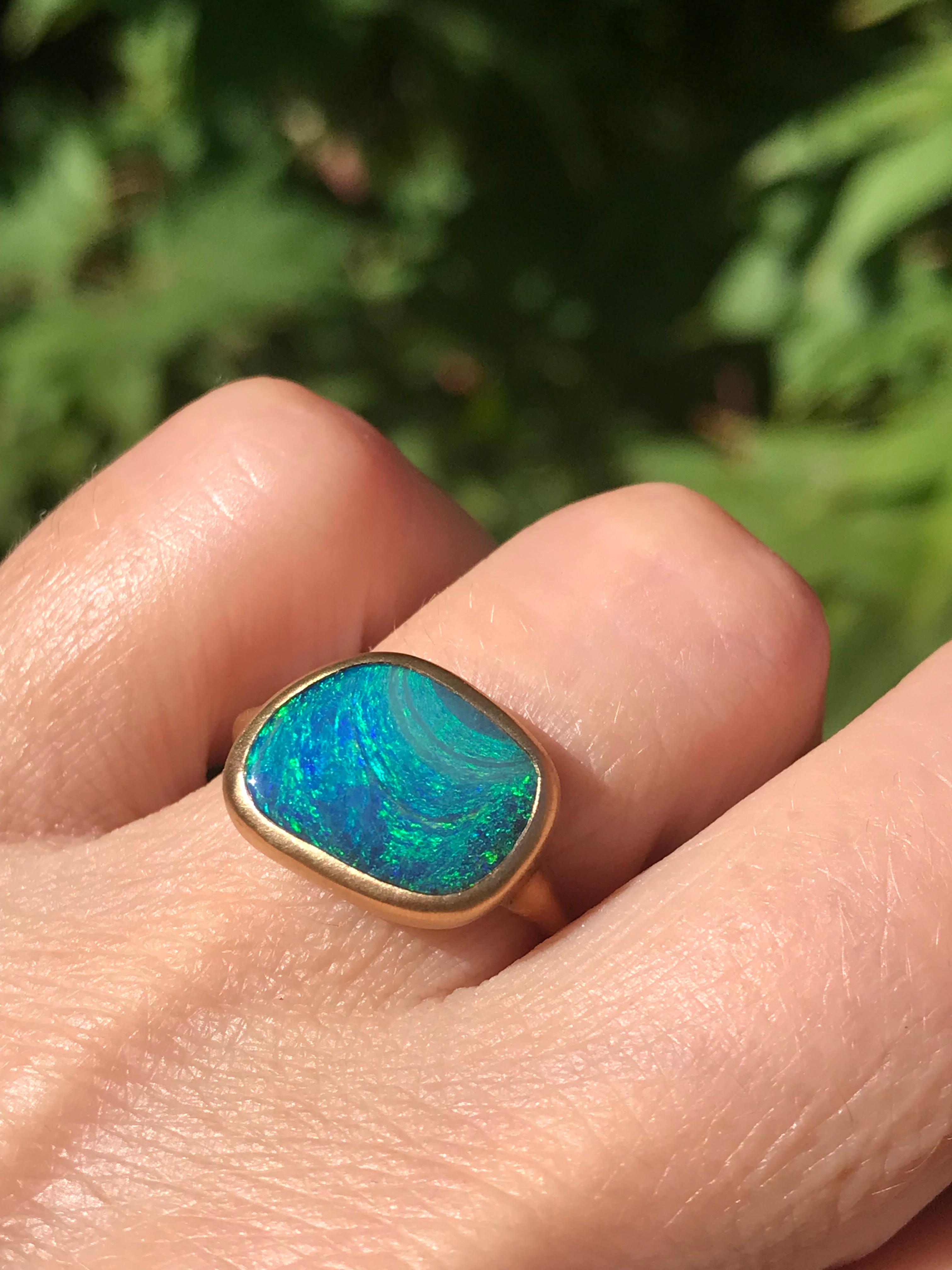 Dalben design One of a kind 18 kt yellow  gold ring with a blue green colors solid Australian Boulder Opal weight 5,38 carats  .
Ring size  US 6   -  EU 52 re-sizable .  
Bezels setting dimension:  
max width 14,3 mm,  
max height 11,2 mm. 
The ring