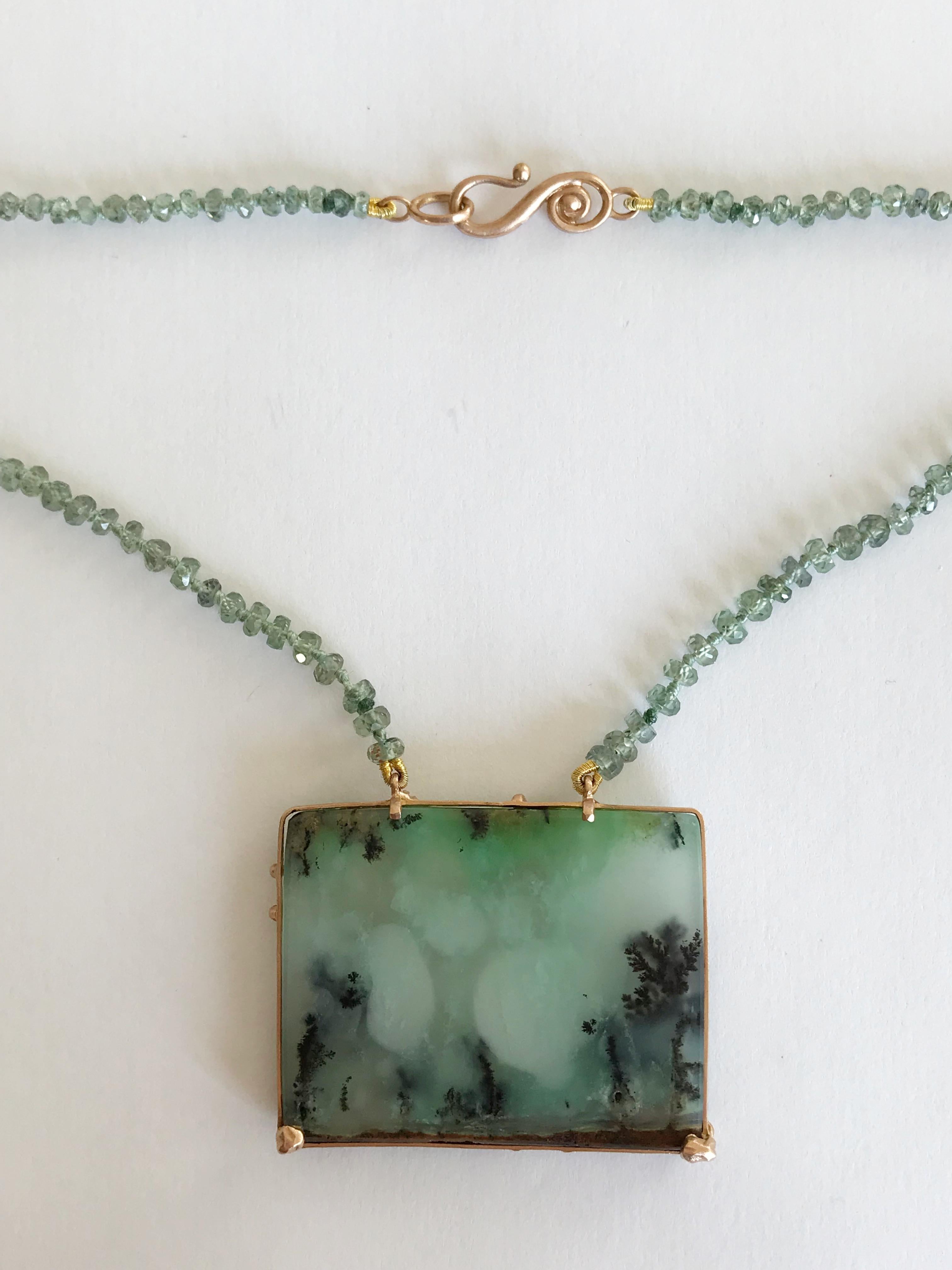 Dalben design necklace composed of a rectangular dendritic chrysoprase , green faceted bead sapphire , 18 k rose gold closure and carved tree bezel setting. 
The necklace length is 26 inch ( 67 cm ).
Bezel dimension: 38,7 x 30 mm
Beads dimension : 