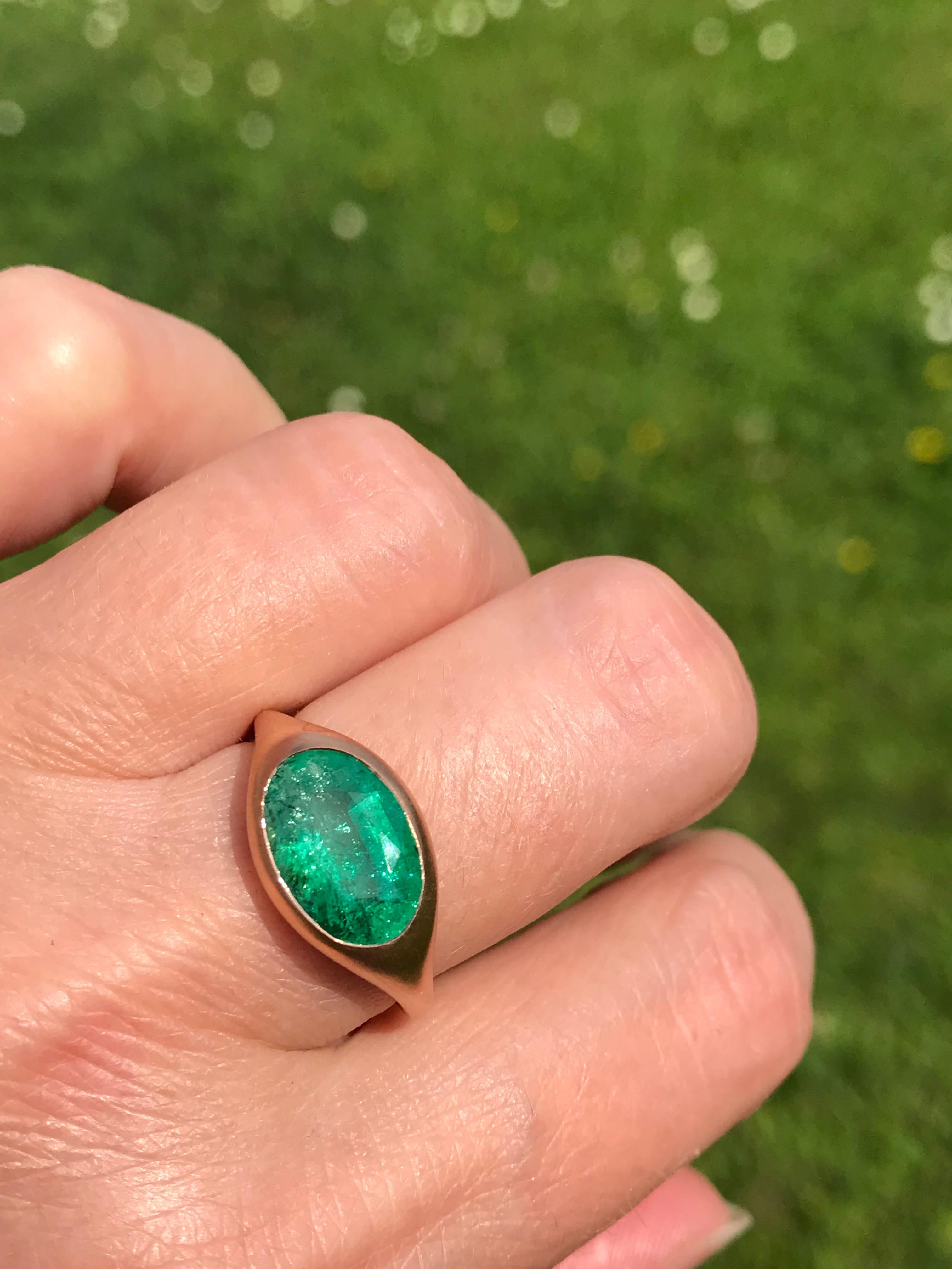 Dalben design One of a Kind 18k rose gold matte finishing ring with a 3,16 carat bezel-set oval faceted cut emerald. 
Ring size 7 1/4 USA - EU 55 re-sizable to most finger sizes. 
Bezel stone dimensions :
height 10 mm
width 14,6 mm
The ring has been