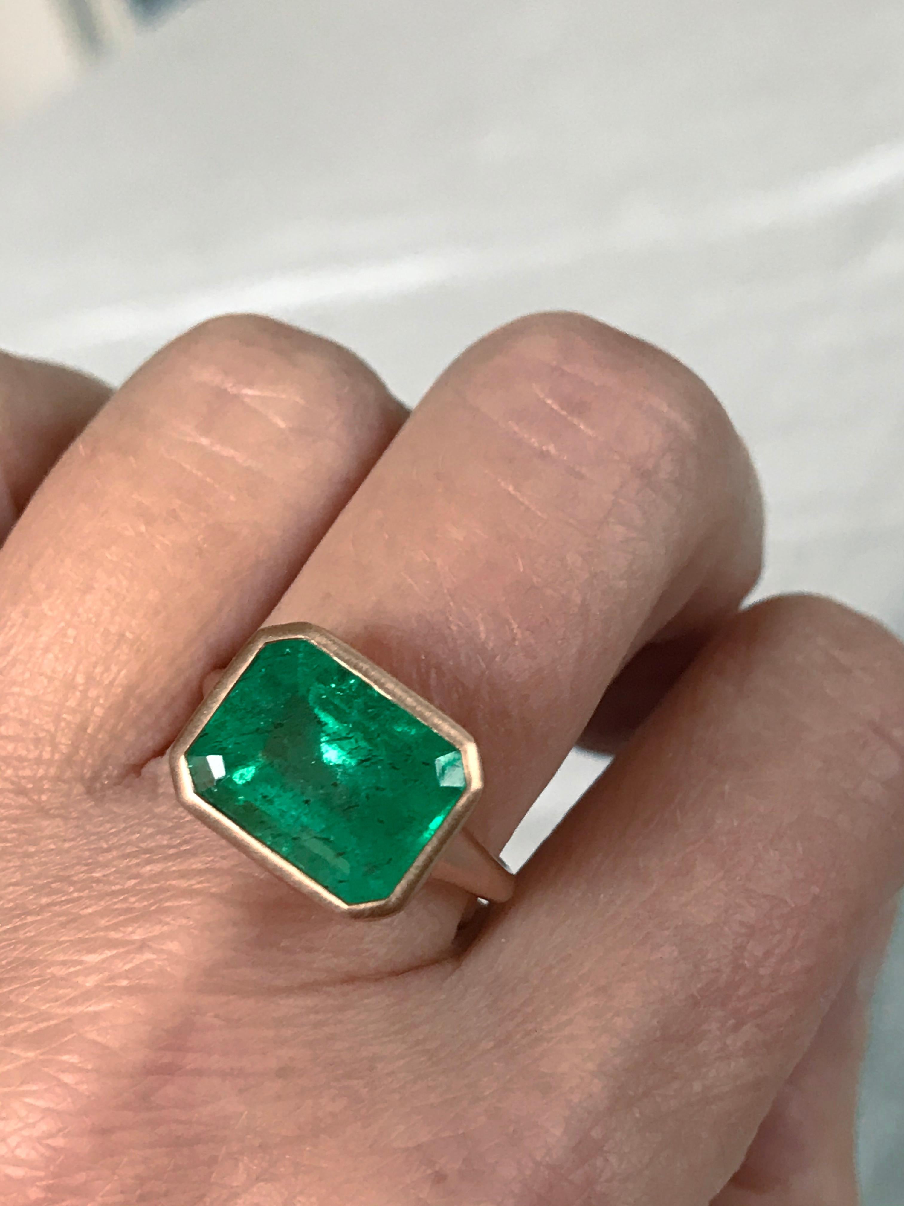 Dalben design One of a Kind 18k rose gold matte finishing ring with a 5,25 carat bezel-set emerald cut emerald. 
Ring size 7 1/4 USA - EU 55 re-sizable to most finger sizes. 
Bezel stone dimensions :
height 11,5 mm
width 14,4 mm
The ring has been