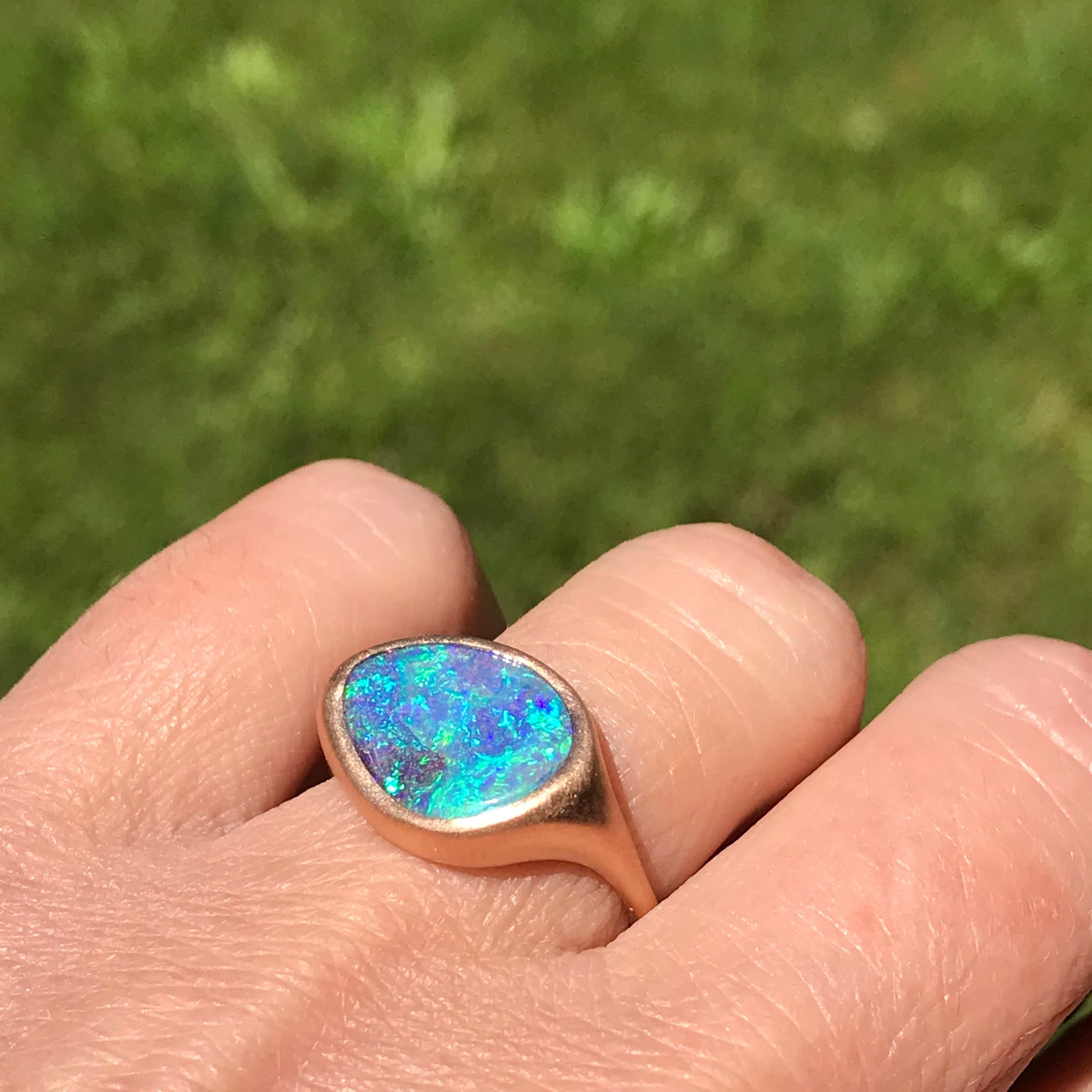 Dalben design One of a kind 18 kt rose gold satin finishing ring with a 3,5 carat bezel-set Australian Boulder Opal .  
The stone has deep blue colors with green light spots .
Ring size 6 US -  52 EU re-sizable to most finger sizes.  
Bezel setting