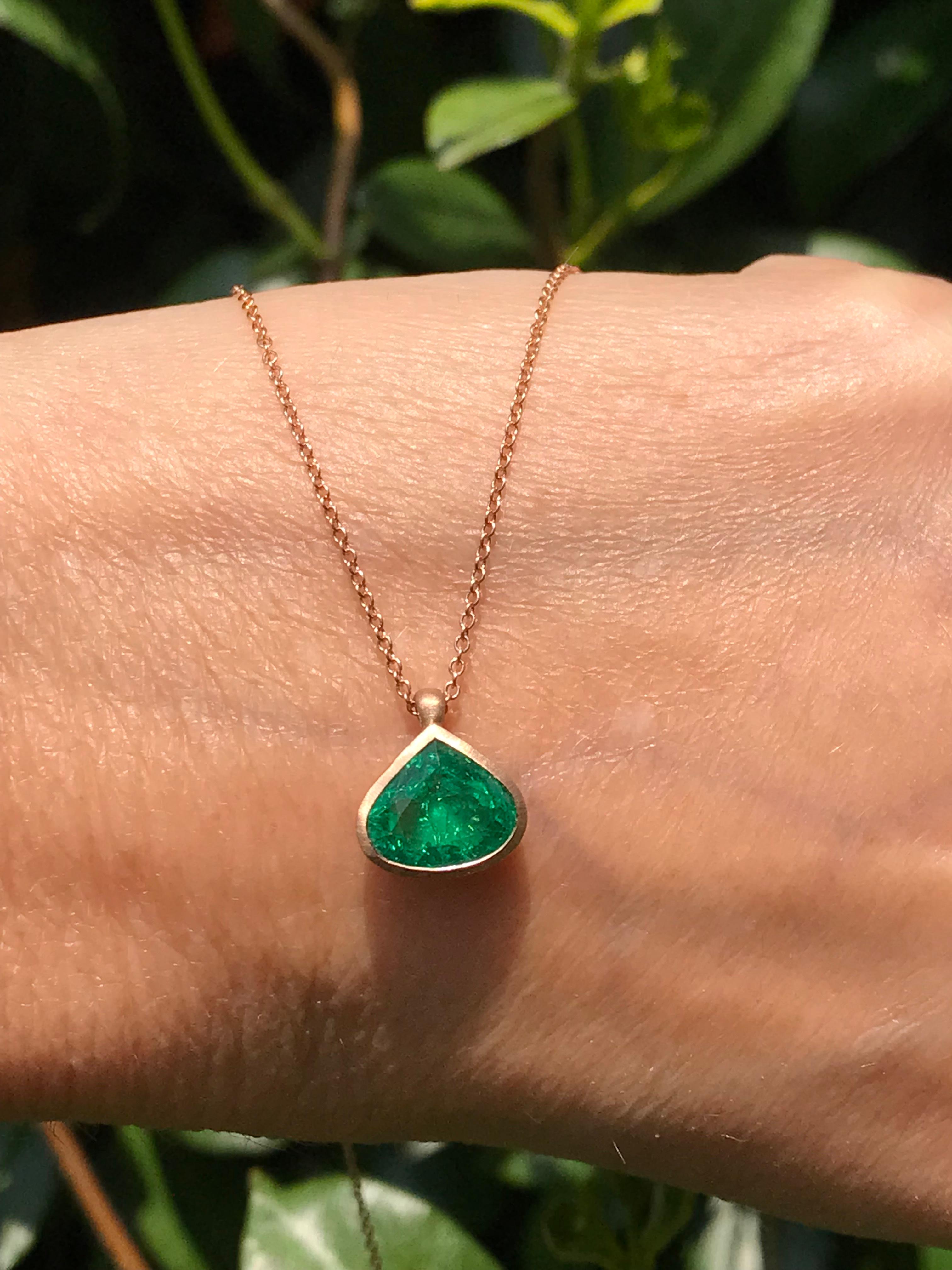 Dalben design  18k rose gold satin finishing pendant  with a bezel-set  faceted drop shape Emerald weight 2,32 carat. 
drop pendant dimension : 
width 10,8 mm
height 9,6 mm
Chain length 44 cm ( 17,3 inch ) resizable
The necklace has been designed