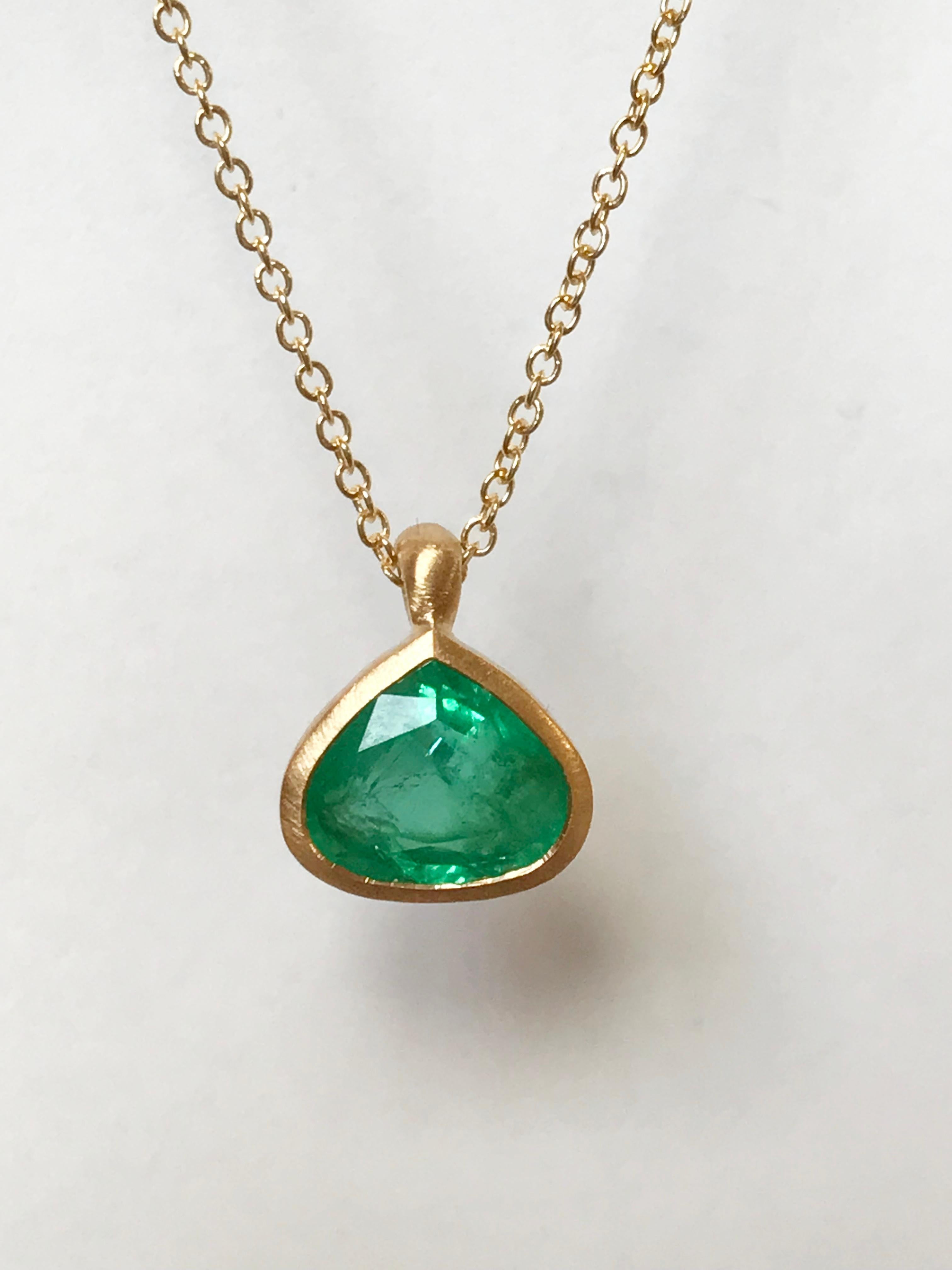 Dalben design  18k yellow gold satin finishing pendant  with a bezel-set  faceted drop shape Emerald weight 1,58 carat. 
drop pendant dimension : 
width 9,4 mm
height 8,6 mm
Chain length 44 cm ( 17,3 inch ) resizable
The necklace has been designed