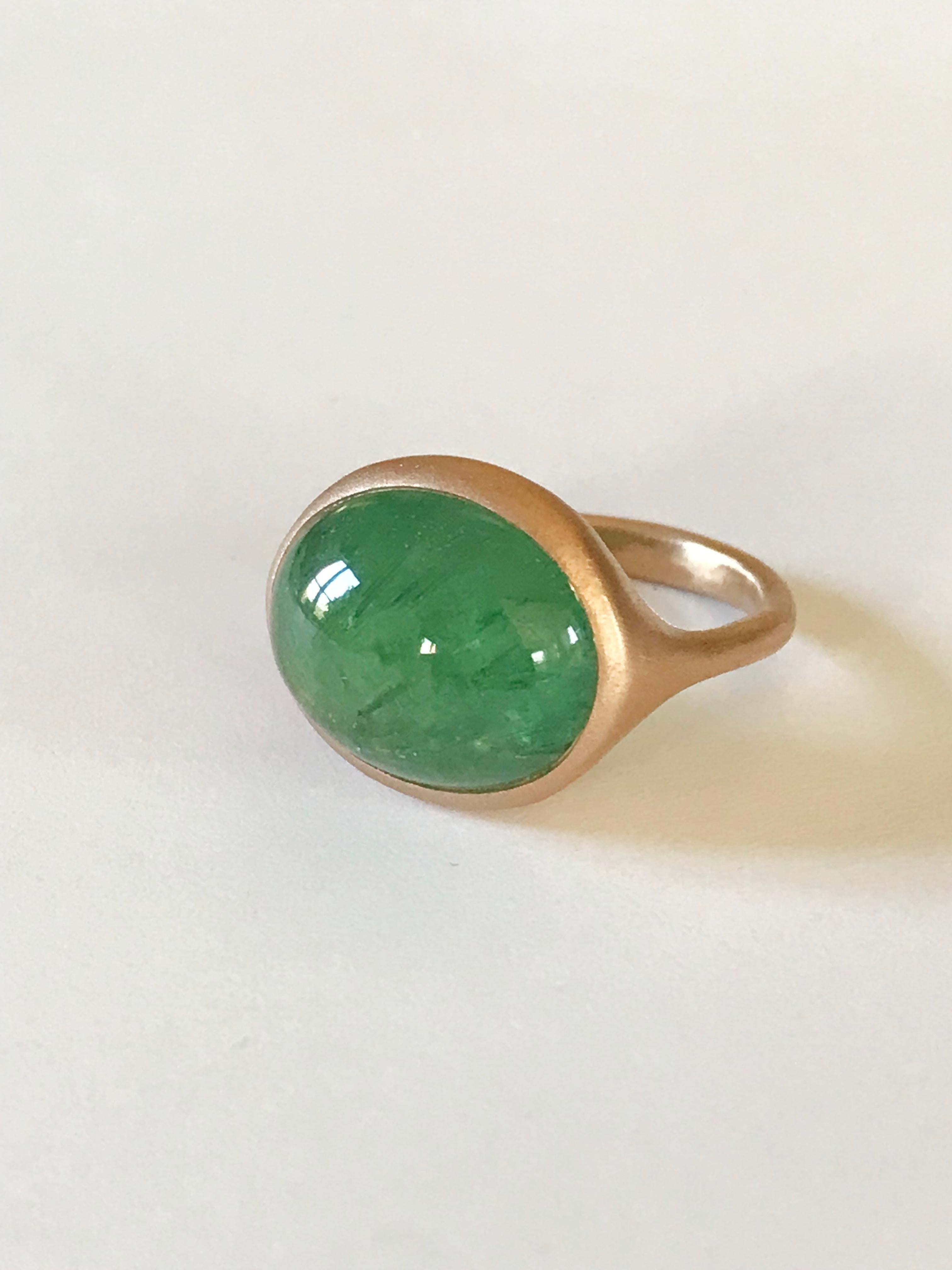 Dalben design  18k rose gold satin finishing ring with a 12,69 carat bezel-set oval cabochon green Tourmaline from Mozambique. 
Ring size 7 1/4 USA - EU 55 re-sizable to most finger sizes. 
Bezel stone dimensions :
height 14,8 mm
width 18,4 mm
The