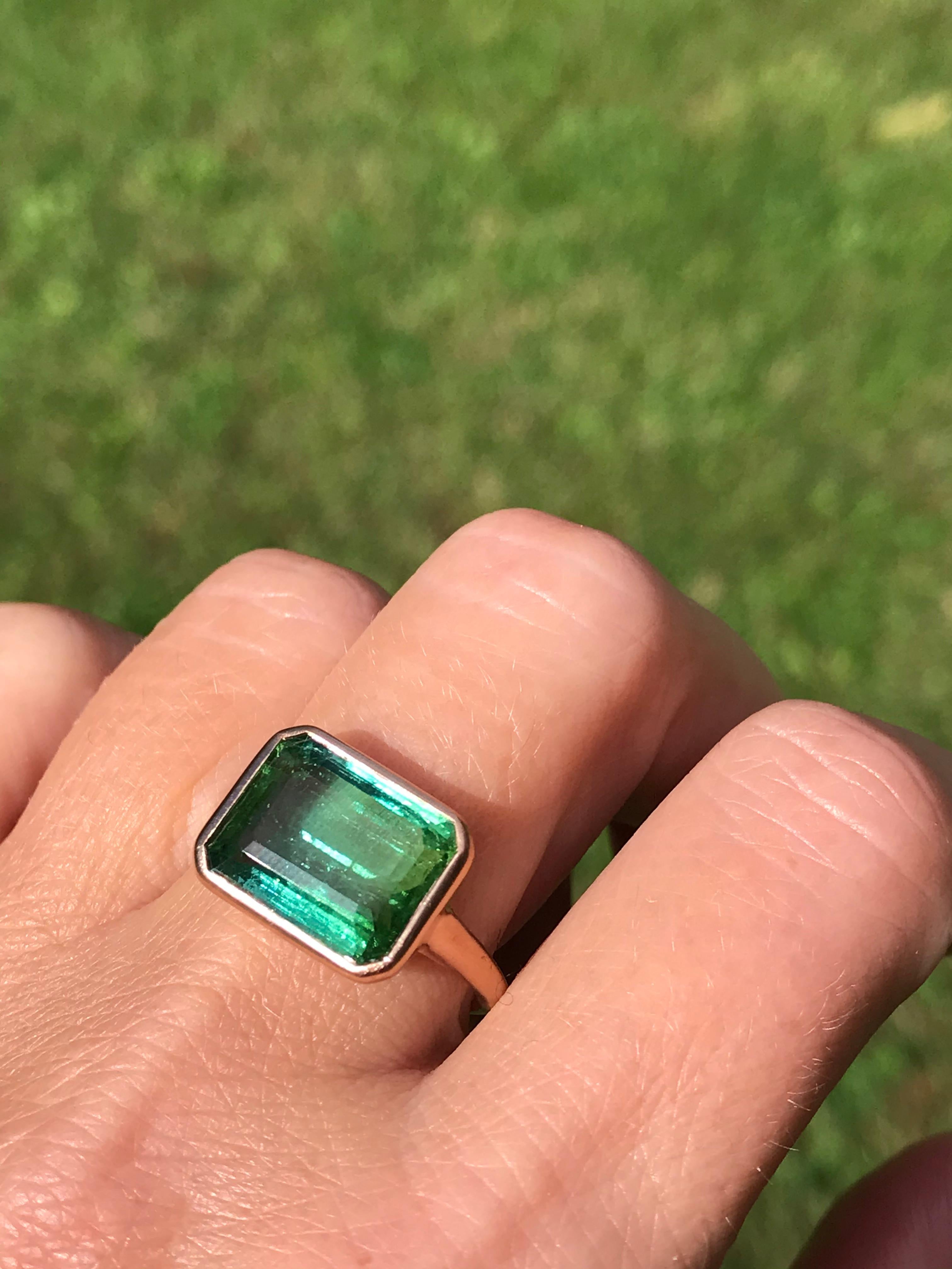 Dalben design  18k rose gold matte finishing ring with a  6,62 carat bezel-set rectangular faceted cut green Tourmaline. 
Ring size 7 1/4 USA - EU 55 re-sizable to most finger sizes. 
Bezel stone dimensions :
height 11,5 mm
width 14,5 mm
The ring