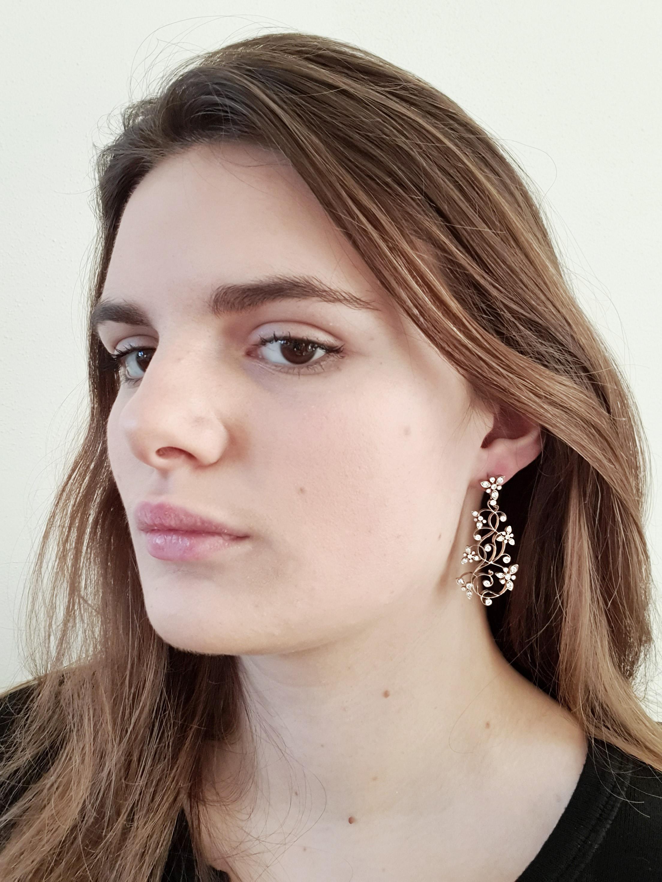 Dalben design Diamonds floral chandelier earrings mounted in 18 kt white gold with 88 white round brilliant cut diamonds total weight 1,50 carats .
Earring dimension: width 22 mm, height 46 mm.  
The earring have been designed and handcrafted in our