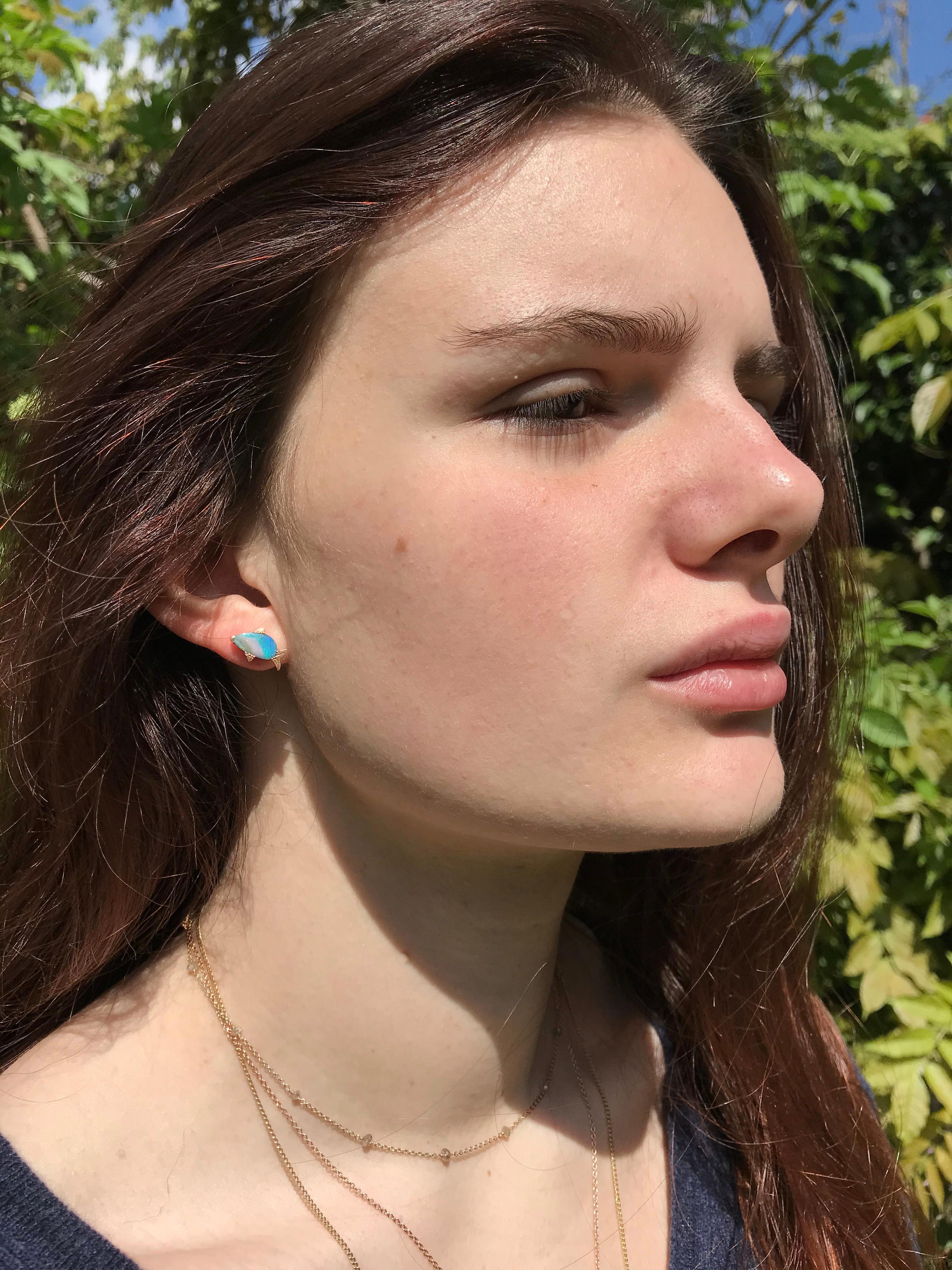 Dalben design  18k rose gold matte finishing stud earrings with two fish shape Australian Boulder opals weight 2,15 carats . 
opal fish dimension:
14,3x9,9 mm 13,1x8,4 mm
You can also purchase  a single fish earring for 900 € .
The earrings has been