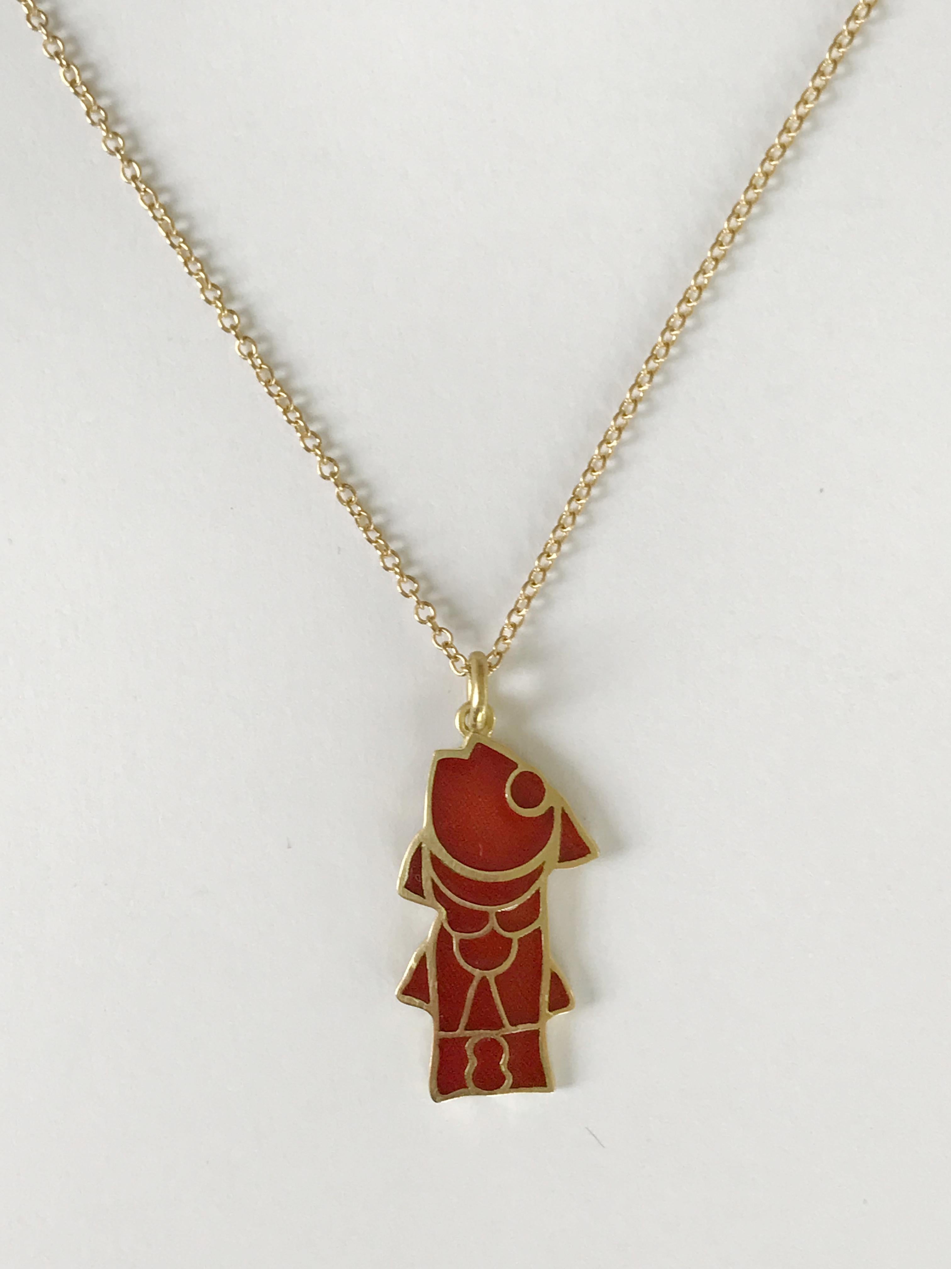 Dalben design fish shape red fire enamel and 18 k yellow gold necklace inspired by Longobard jewelry.
Fish dimensions :
height 29,3 mm
width 14,6 mm
Chain length 58 cm
The pendant has been designed and handcrafted in our atelier in Como Italy with a