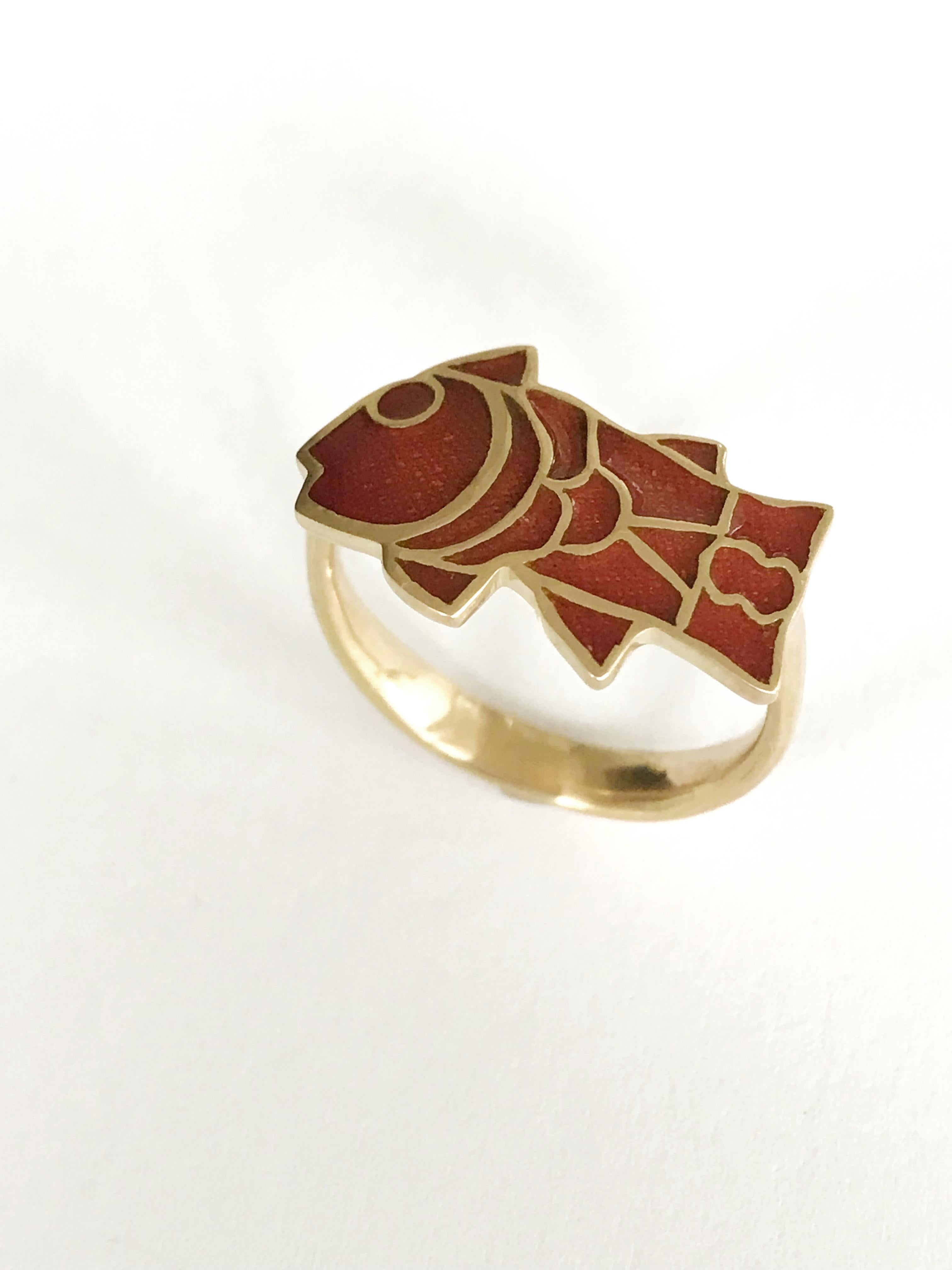 Dalben design fish shape red fire enamel and 18 k yellow gold ring inspired by Longobard jewelry.
Ring size 6 3/4 USA - EU 54 .
Fish dimensions :
height 12,2 mm
width 19,2 mm
The ring has been designed and handcrafted in our atelier in Como Italy