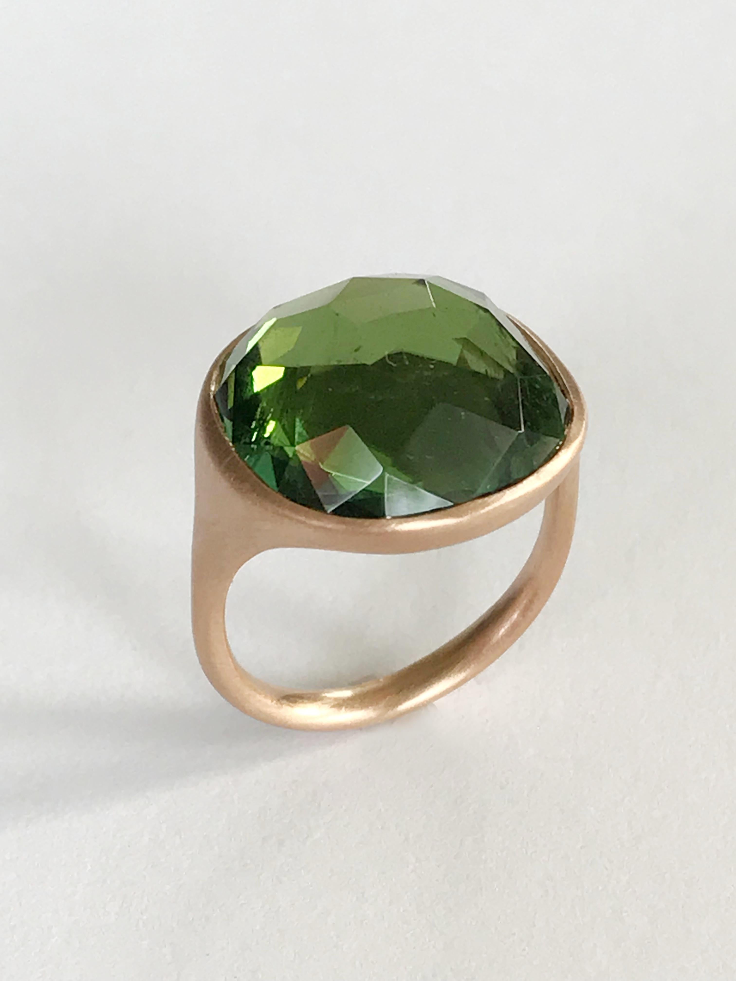 One of a Kind 18k rose gold matte finishing ring with a 13,4 carat bezel-set cushion cut faceted green Tourmaline.  
Ring size 7 1/4 - EU 55 re-sizable to most finger sizes.  
Bezel stone dimensions : width 18,2 mm height 16,9 mm.
The ring is