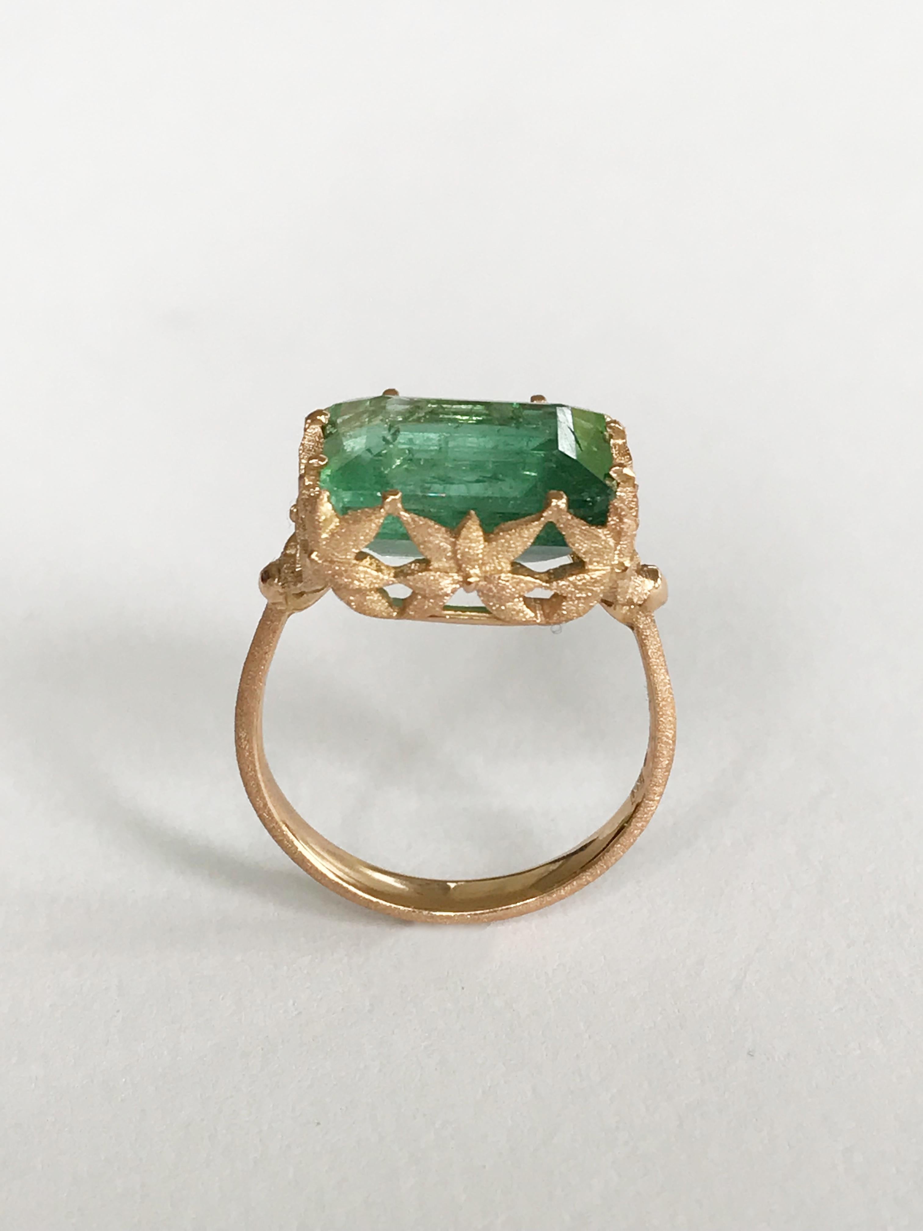 Dalben design 18 kt hand engraved rose gold leaf motif Cocktail Ring with an emerald cut  Green Tourmaline weighting 6,75 carat,
Bezel setting dimension:
width 13,9 mm,
height 12,2 mm. 13,40 carat .  
Ring size 6 3/4 USA - 54 EU resizable to most