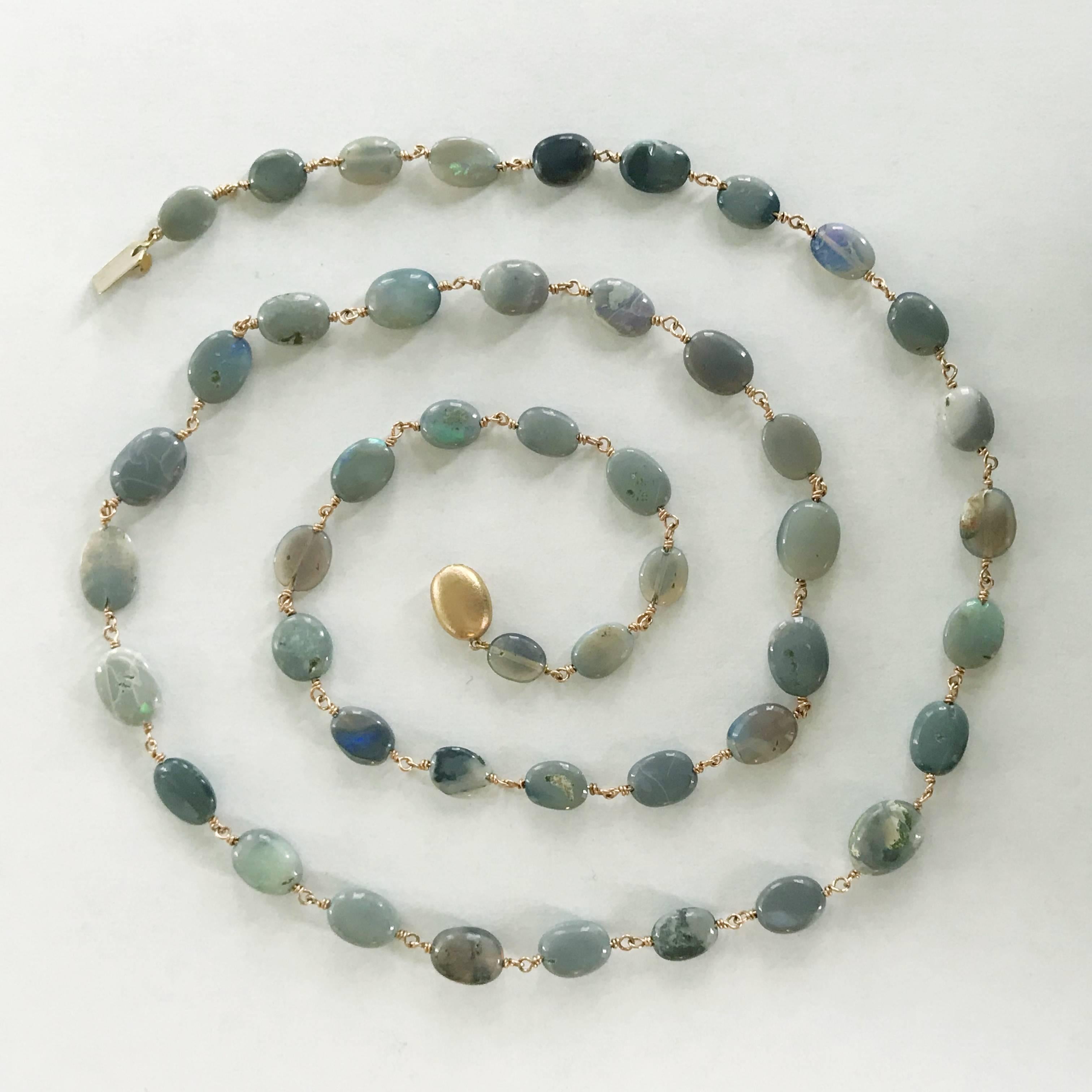 Dalben design one of a kind hand crafted necklace composed of Australian opals oval bead hand-linked with 18 k rose gold. 
The necklace length is 29,5 inch ( 75 cm ) with a 18 k rose gold clasp satin finished.
The australian opals color is gray with