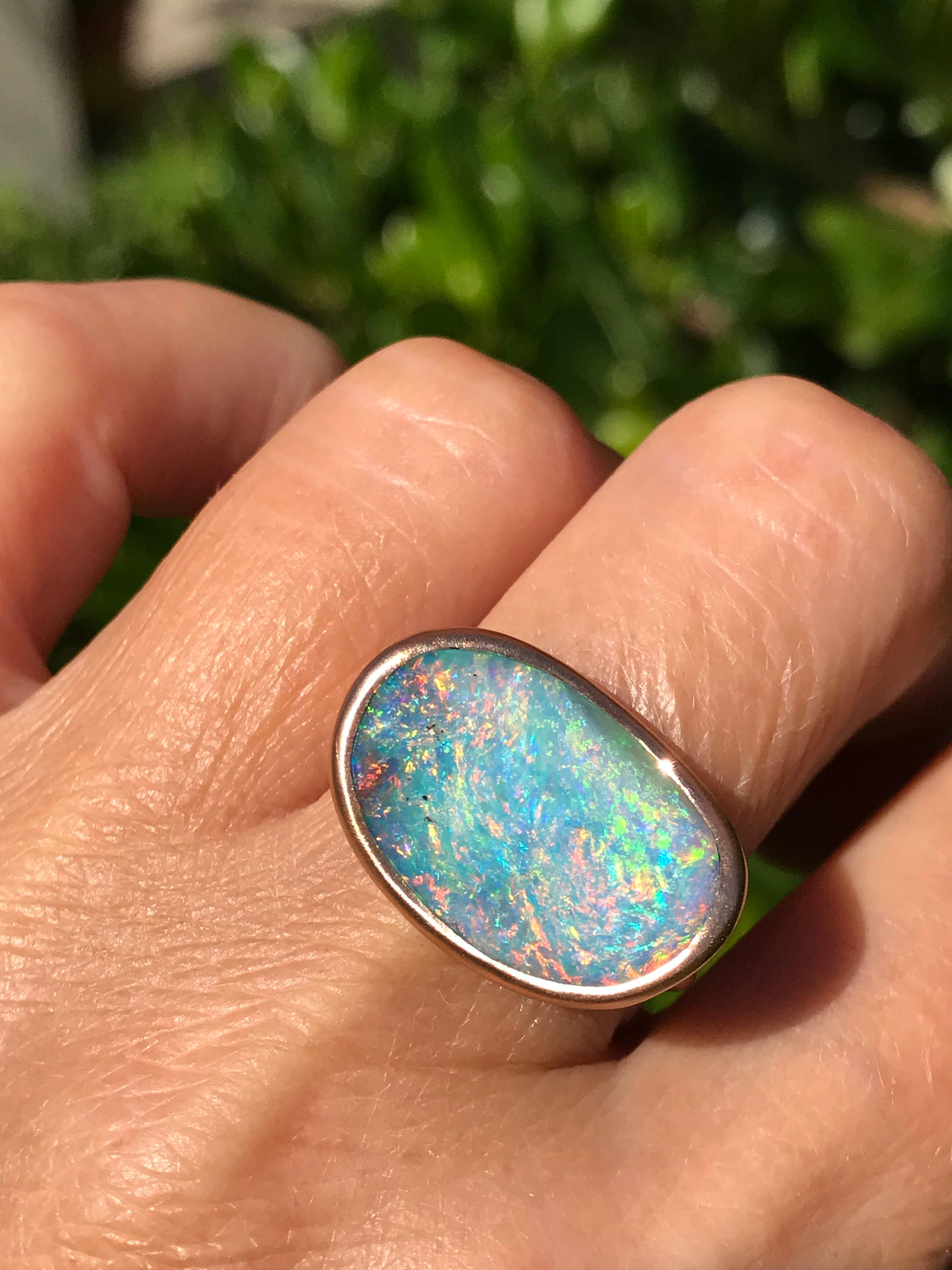 Dalben design 18k rose gold satin finishing ring with a  9,7 carat bezel-set organic shape magnificent Queensland mine Australian boulder opal . 
The Australian Opal have blue , pink and green spots.
Ring size US  7 1/4-  - EU 55- re-sizable to most