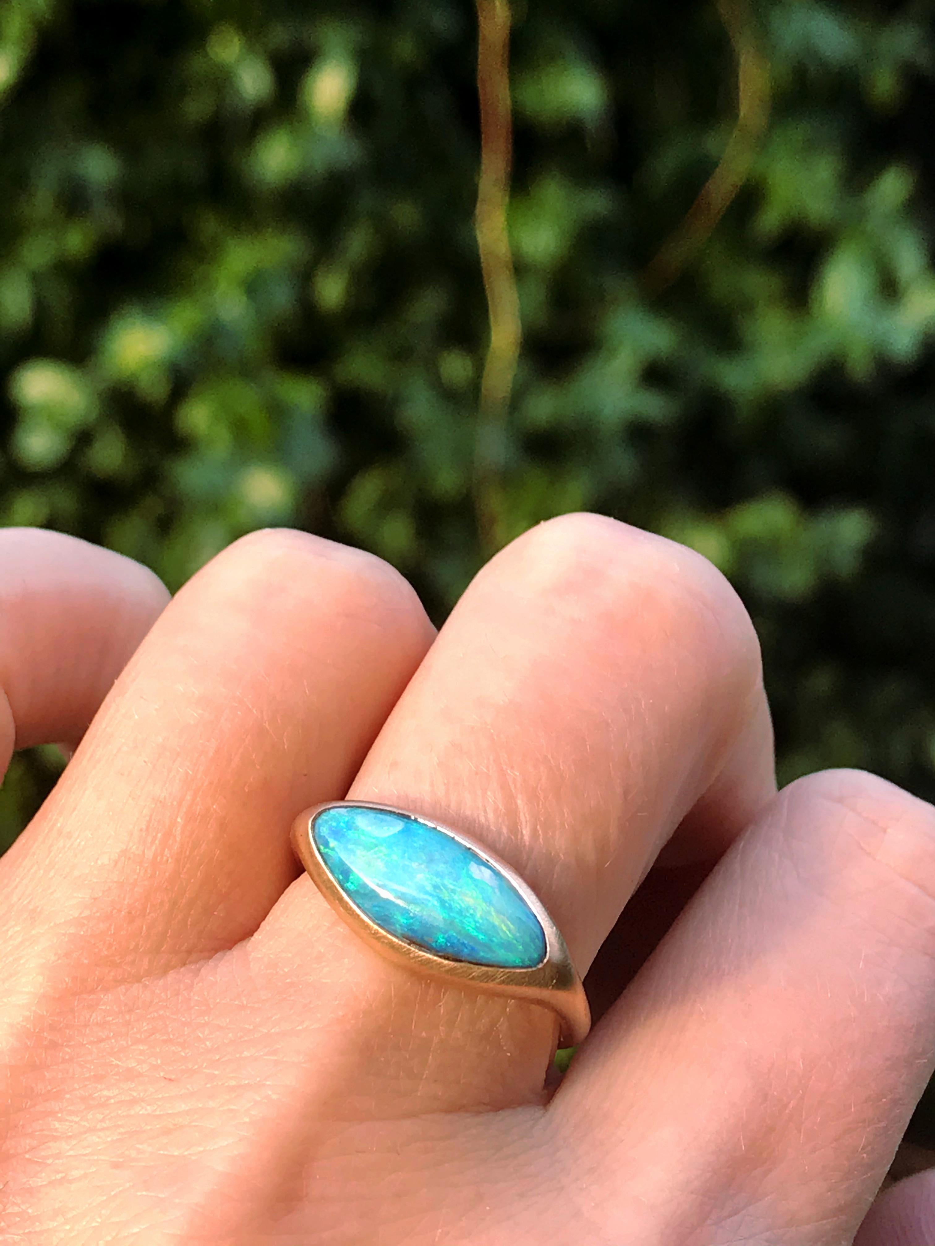 Dalben design One of a kind 18 kt rose gold ring with a 3,02 carat bezel-set deep light blue navette shape Australian Boulder Opal  .  
Ring size 7 1/4 - EU 55 re-sizable .  
Bezel setting dimension:  
max width 18,7 mm,  
max height 8,7 mm. 
The