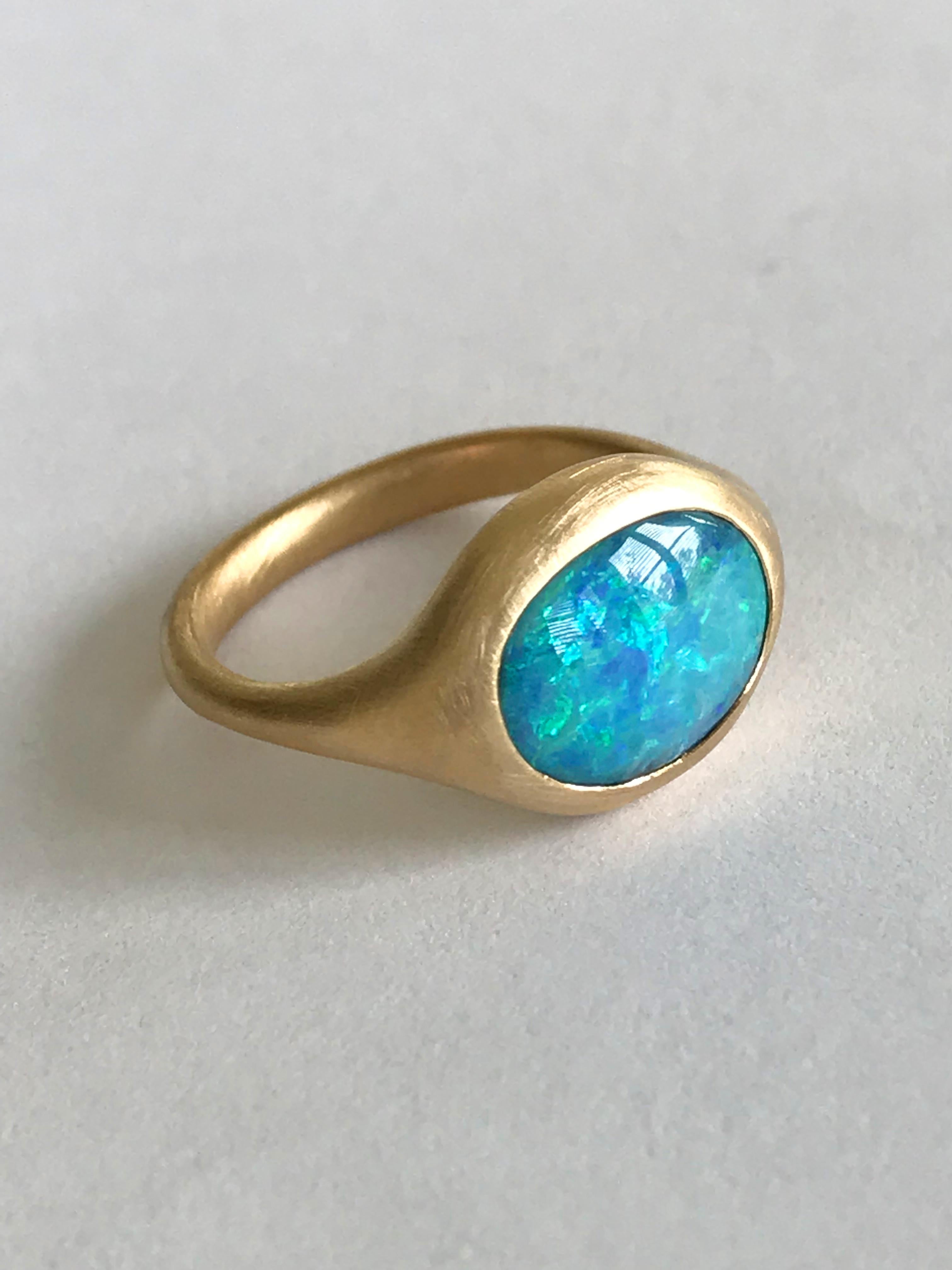 Dalben design One of a kind 18 kt yellow gold ring with a 3,24 carat bezel-set deep light blue oval Australian Boulder Opal  .  
Ring size 6 3/4 - EU 54 re-sizable .  
Bezel setting dimension:  
max width 14,9 mm,  
max height 11,5 mm. 
The ring has
