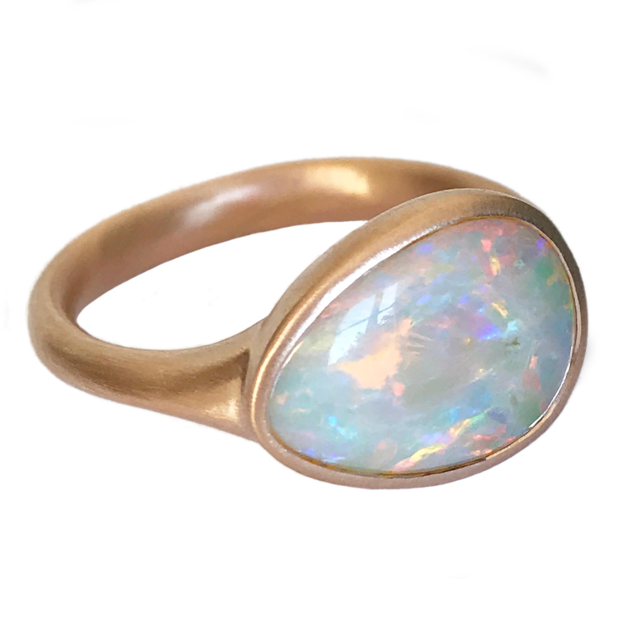 Dalben design 18k rose gold satin finishing ring with a  3,07 carat bezel-set pear shape magnificent Lightning Ridge Australian crystal opal . 
The Lightning Ridge Australian crystal Opal have pink, green. orange, blue spots.
Ring size US  7 1/2 -