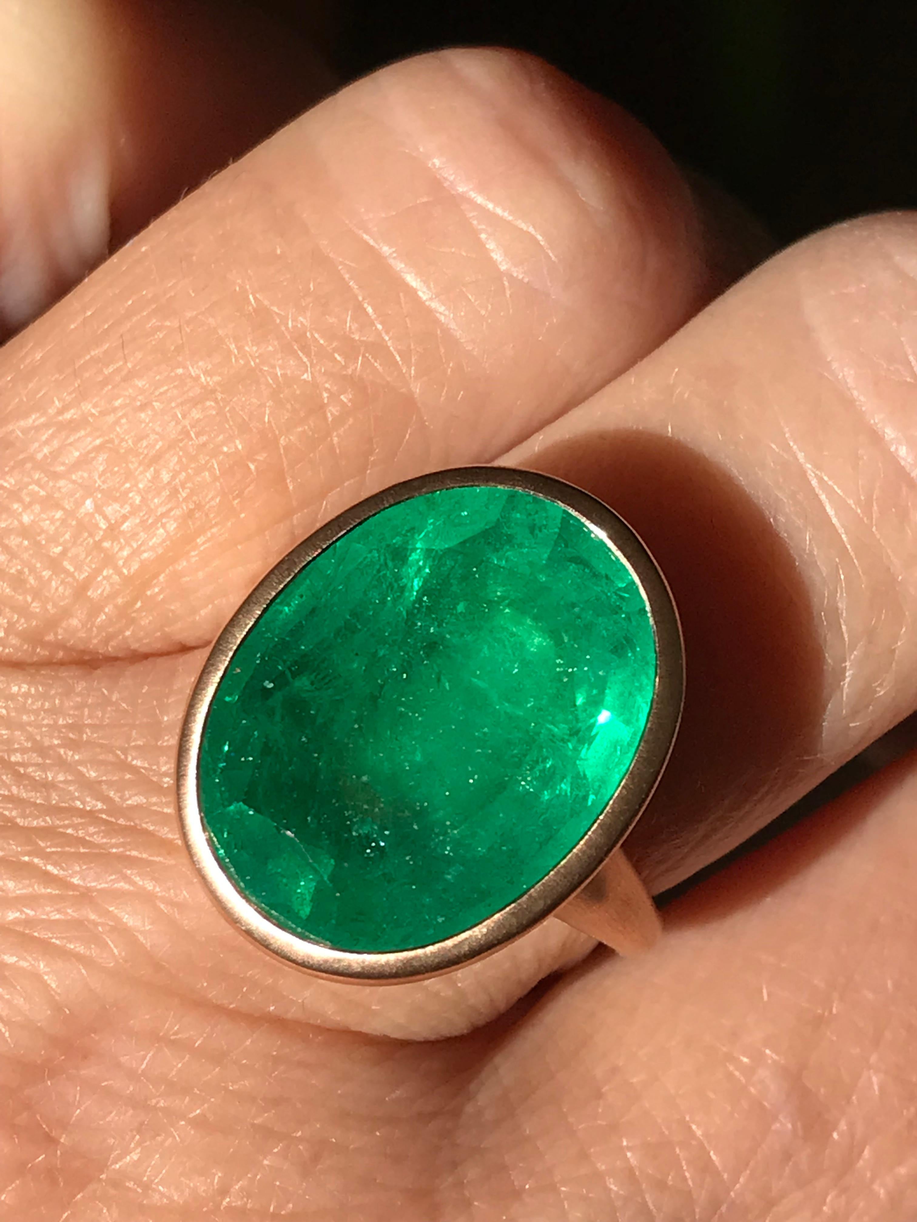 Dalben design One of a Kind 18k rose gold satin finishing ring with a magnificent 13,11 carat bezel-set oval faceted cut emerald. 
The emerald is accompanied by IGI (Italian Gemological Institute ) International Certificate.
Ring size 7 1/4 USA - EU