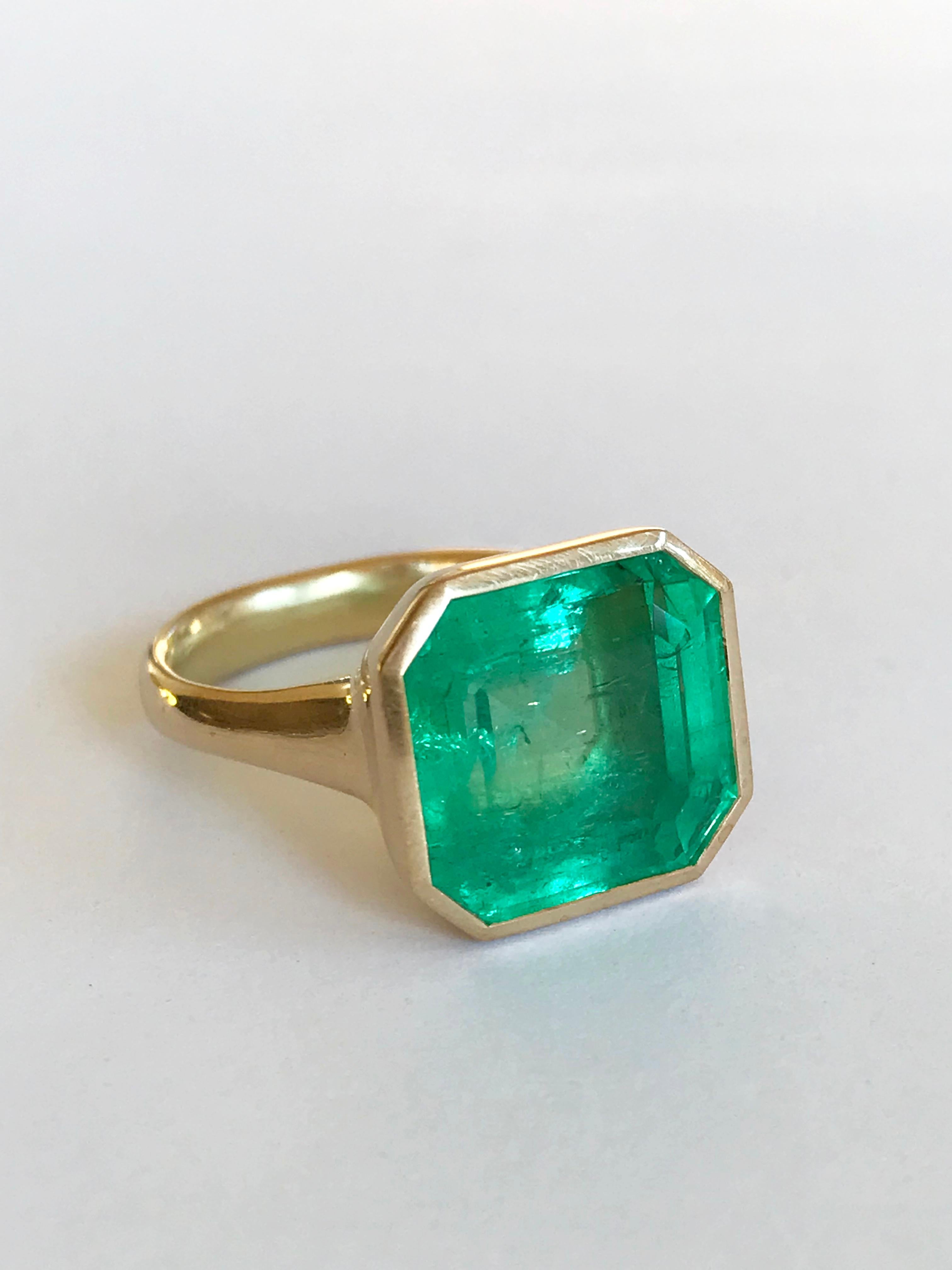 Dalben design One of a Kind 18k yellow gold semi lucid finishing ring with a magnificent 9,69 carat bezel-set emerald cut Colombian emerald. 
The Colombian emerald is accompanied by IGI (Italian Gemological Institute ) Certificate.
Ring size 7 1/4