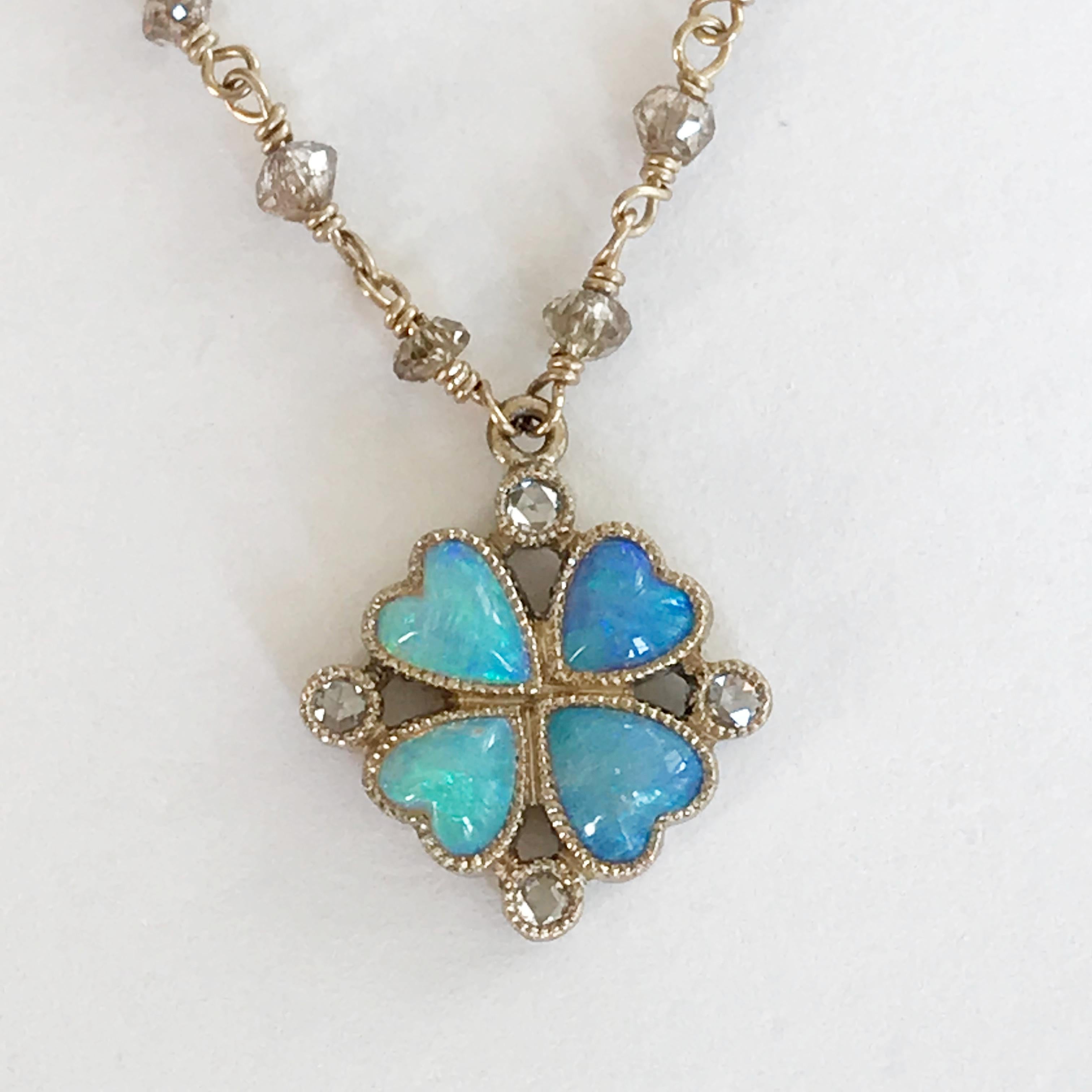 Dalben design hand crafted necklace composed of a  four-leaf clover with 4 heart shape Australian Opals and 4 rose cut  Diamonds weighing 0,03 ct  mounted on a white gold 18k rosary-style chain with faceted light brown diamond beads spaced at even