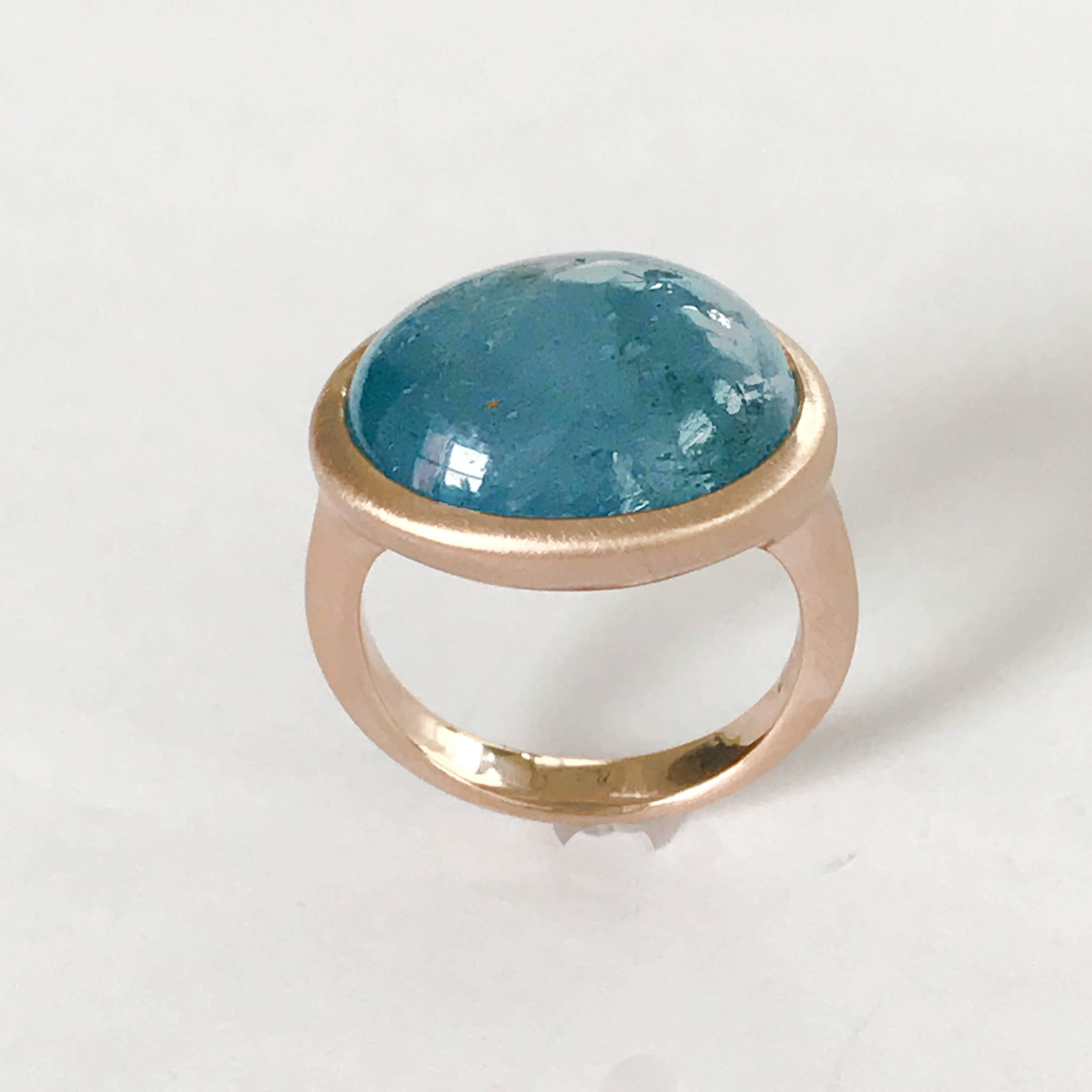 Dalben design One of a Kind 18k rose gold matte finishing ring with a  14,7 carat bezel-set cabochon cut Aquamarine. 
Ring size 7 - EU 55 re-sizable to most finger sizes.  
Bezel stone dimensions :  
width 20 mm  
height 16,60 mm  
The ring has been