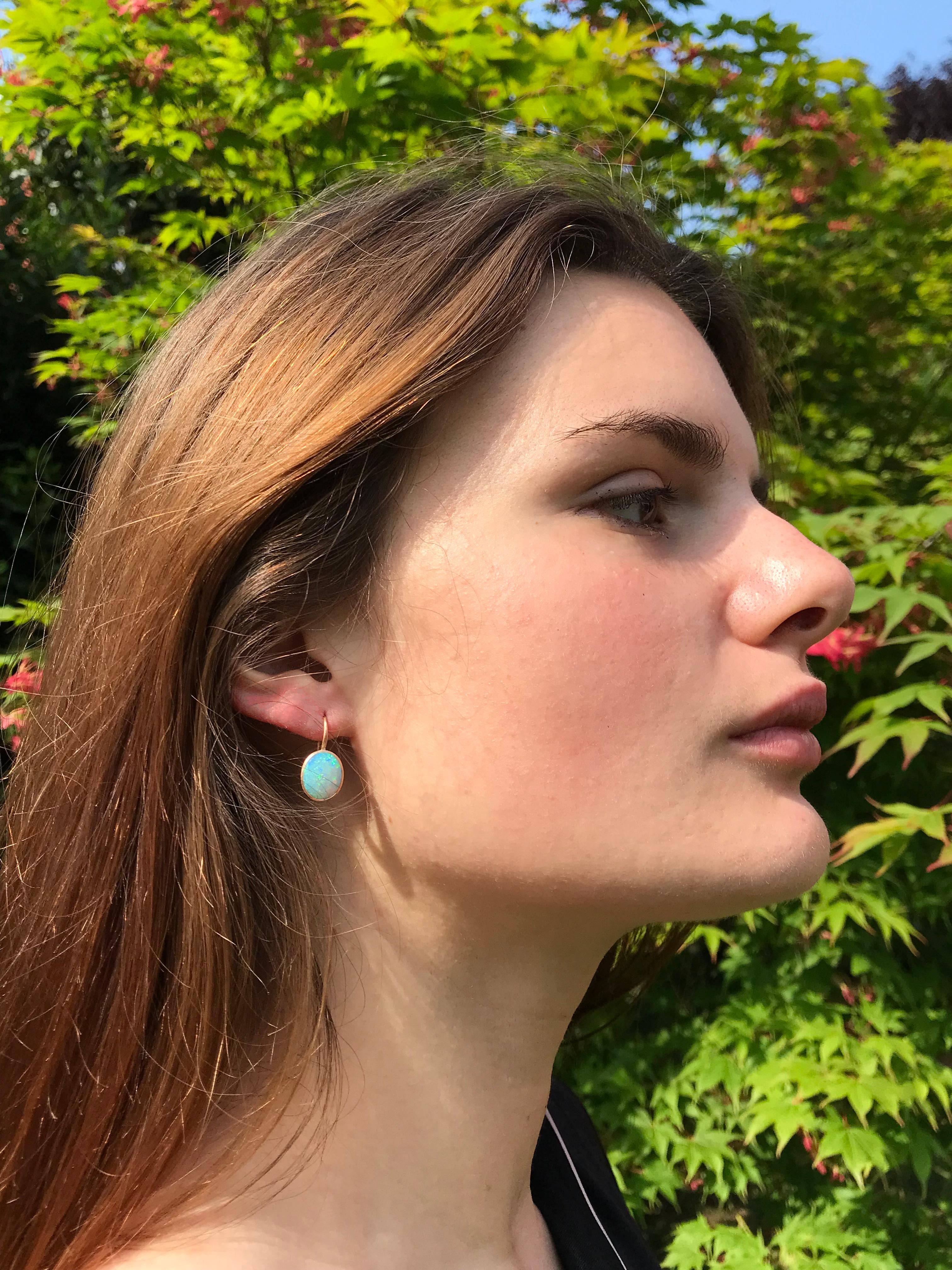Dalben design  18k rose gold matte finishing small earrings with two bezel-set oval cabochon  light blue Australian solid opals weight 3,28 carats . 
Bezel stone dimensions :
width 10 mm
height without leverback 11,9 mm
height with leverback 20,7