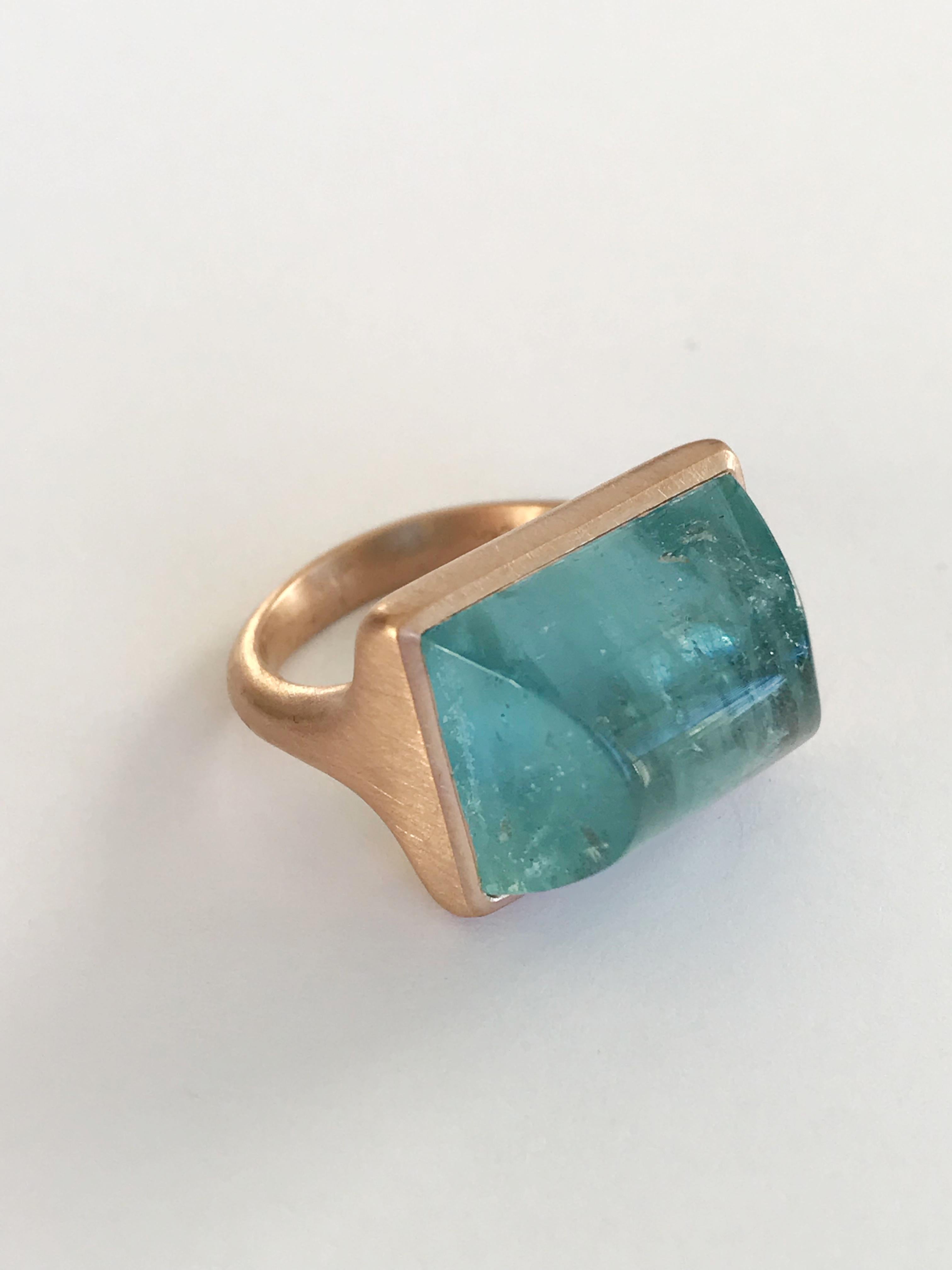 Dalben design One of a kind 18 kt rose gold matte finishing ring with a 17,05 carat bezel-set  rectangular cabochon Aquamarine  .  

Ring size 7 1/4 - EU 55 re-sizable to most finger sizes.  
Bezel setting dimension:  
width 18,9 mm,  
height 14,4