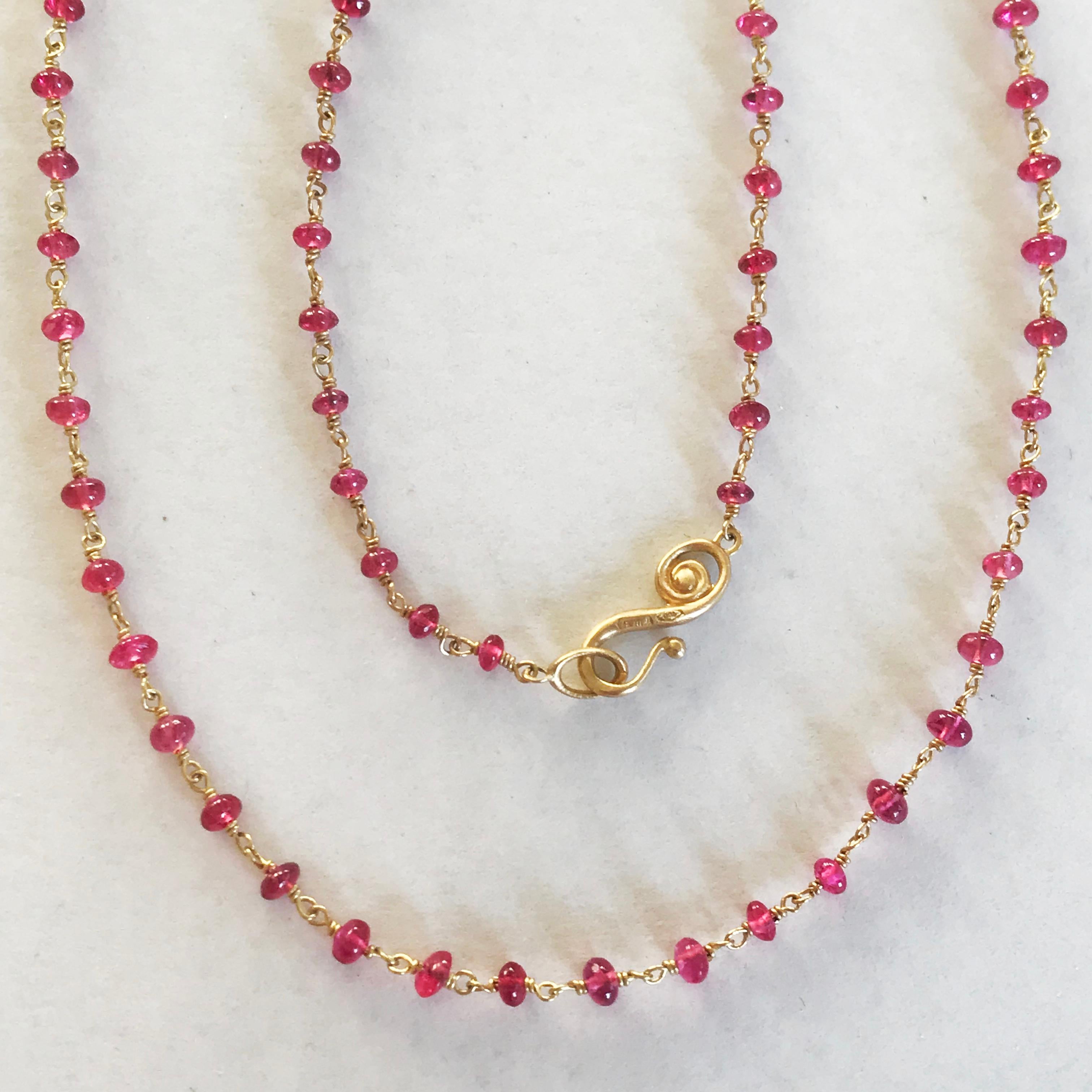 red beads gold necklace