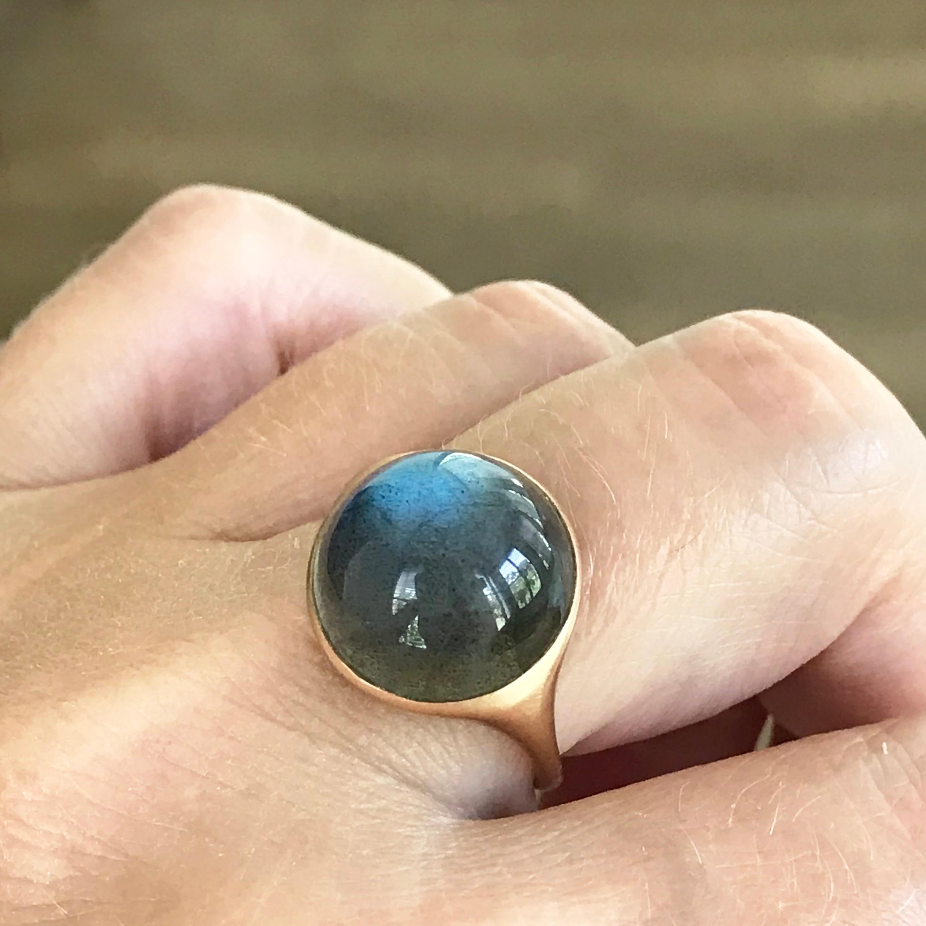 Dalben design 18k rose gold satin finishing ring with a  11,8 carat bezel-set round cabochon labradorite .
Ring size 7 1/4 - EU 55 re-sizable to most finger sizes.
Bezel setting dimension: 
width 15,5 mm, 
height 15,5 mm. 
The ring has been designed