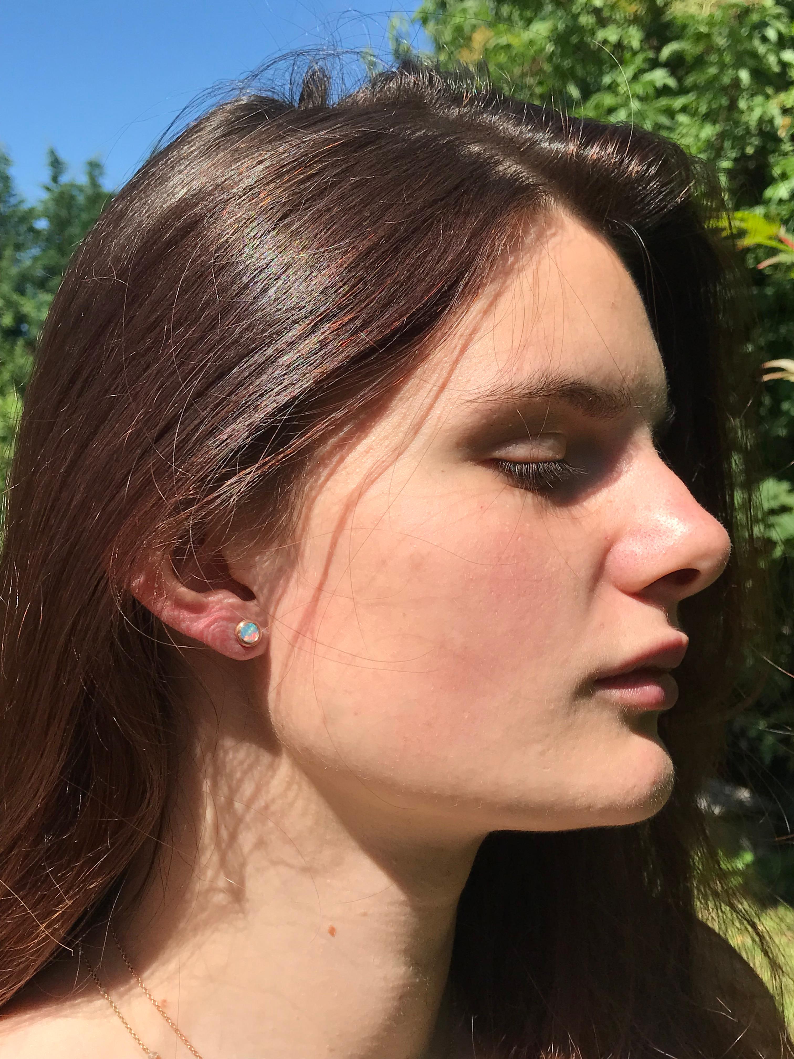 Dalben design  18k rose gold matte finishing stud earrings with two bezel-set round cabochon pink-blue Australian solid opals weight 0,4 carats . 
Bezel stone dimensions  6,7 mm .
The earrings has been designed and handcrafted in our atelier in Como