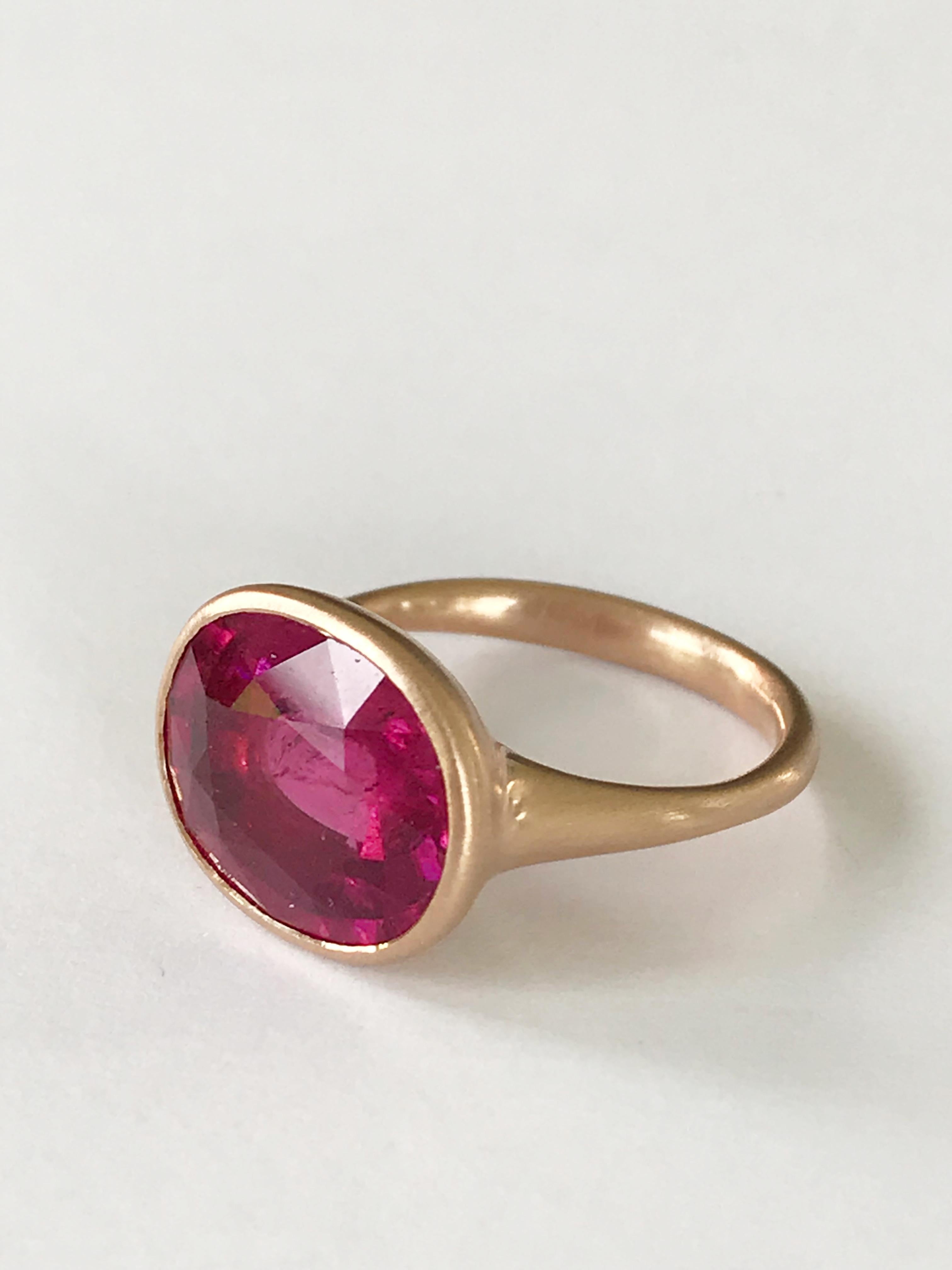 Dalben design  18k rose gold matte finishing ring with a 6,20 carat bezel-set oval faceted cut Rubellite ( Red Tourmaline ). 
Ring size 7 1/4 USA - EU 55 re-sizable to most finger sizes. 
Bezel stone dimensions :
height 12,4 mm
width 14,9 mm
The