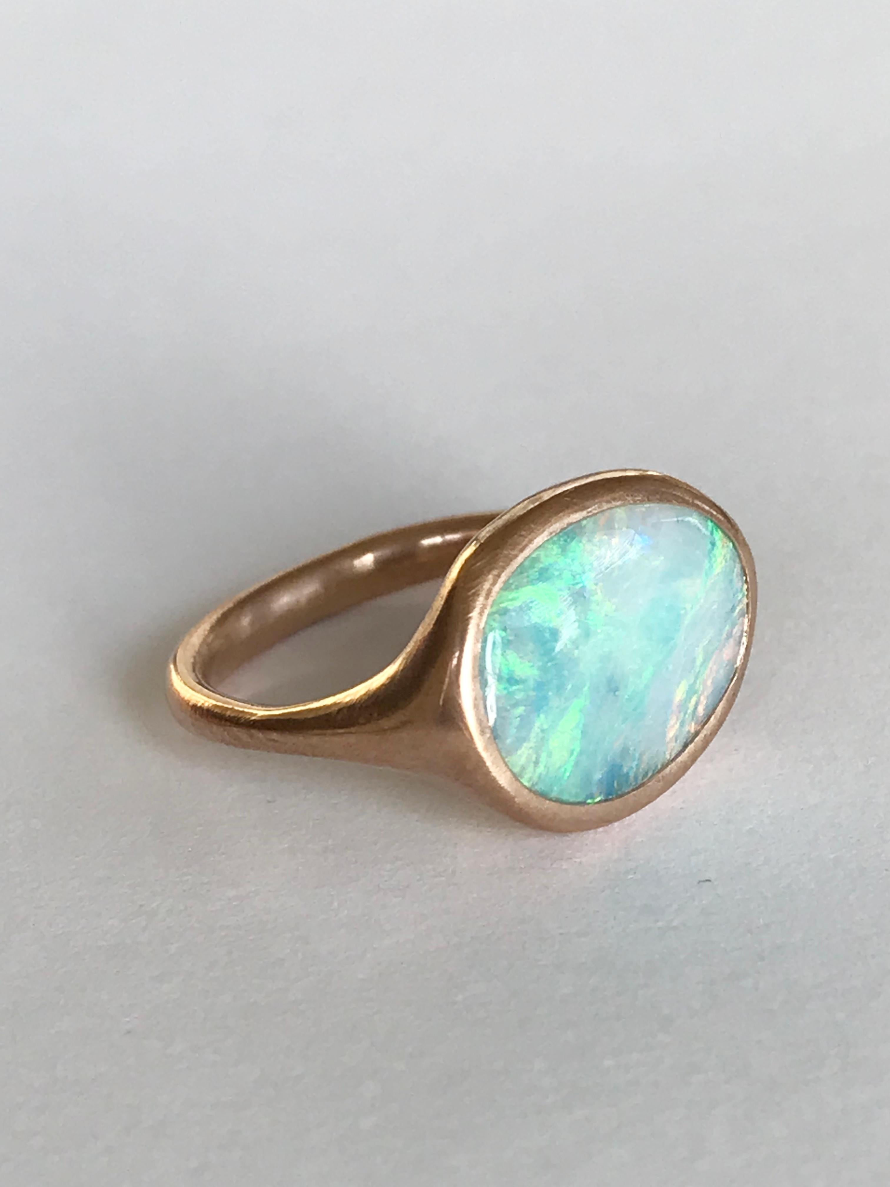 Dalben design One of a kind 18 kt rose gold matte finishing ring with a 3,98 carat bezel-set oval Australian Boulder Opal .  
The stone has light blue pastel colors with green light spots.
Ring size 6 3/4 - EU 54 re-sizable to most finger sizes. 