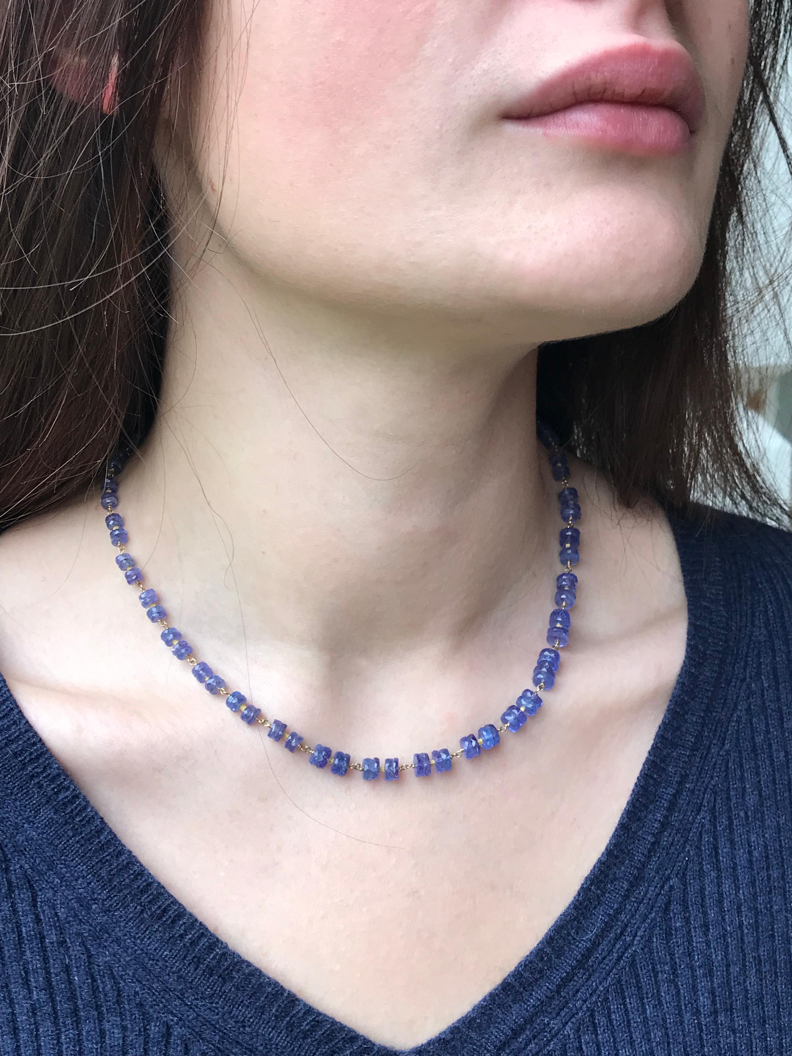Dalben design hand crafted necklace composed of faceted tanzanite rondelle hand-linked with 18 k yellow gold. The necklace length is 17 inch (43 cm) and the yellow gold closure is satin hand engraved. 