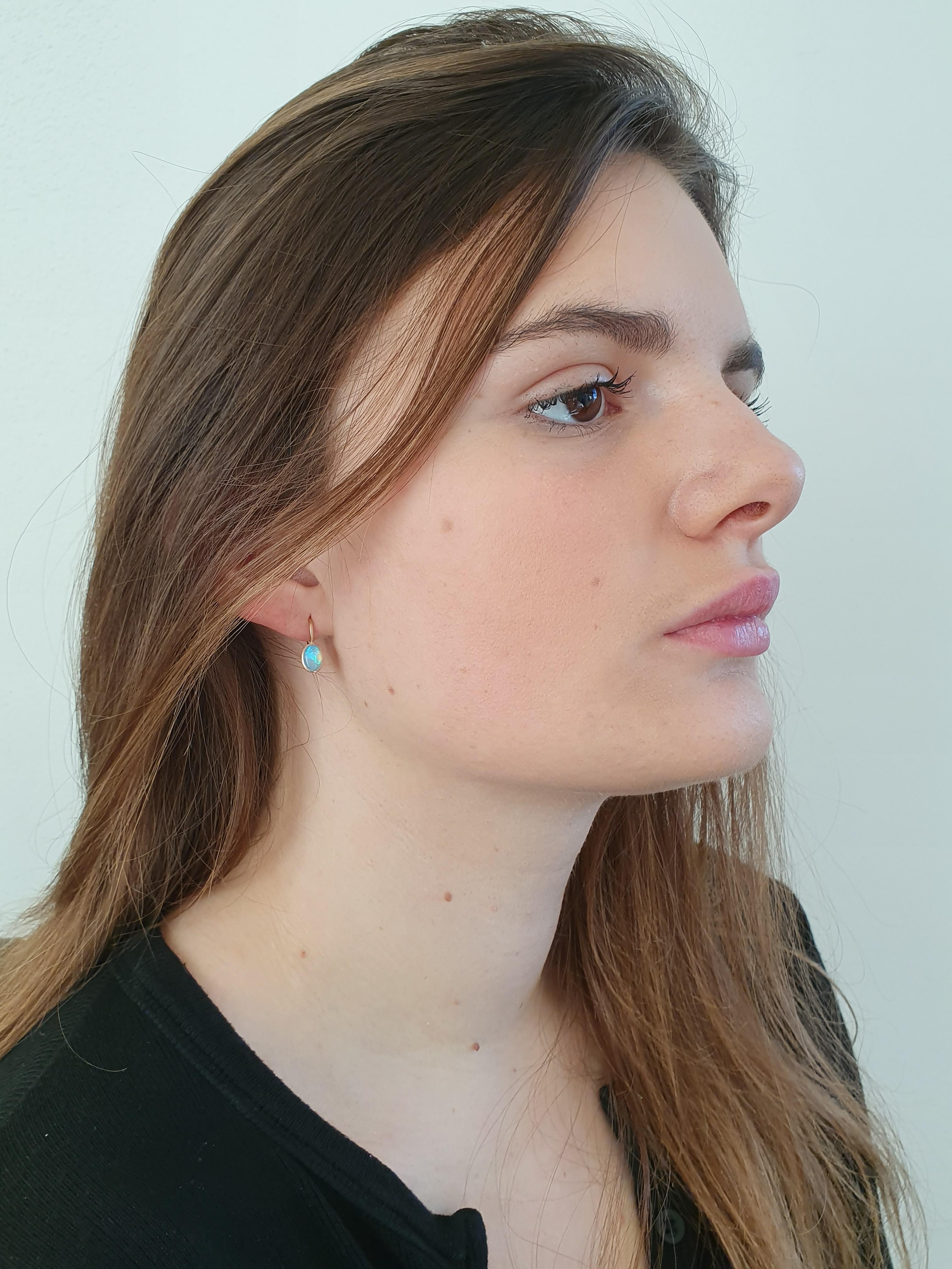 Dalben design  18k rose gold matte finishing tiny earrings with two bezel-set oval cabochon blue Australian solid opals weight 1,08 carats . 
Bezel stone dimensions :
width 6 mm
height without leverback 8 mm
height with leverback 15 mm
Consider that