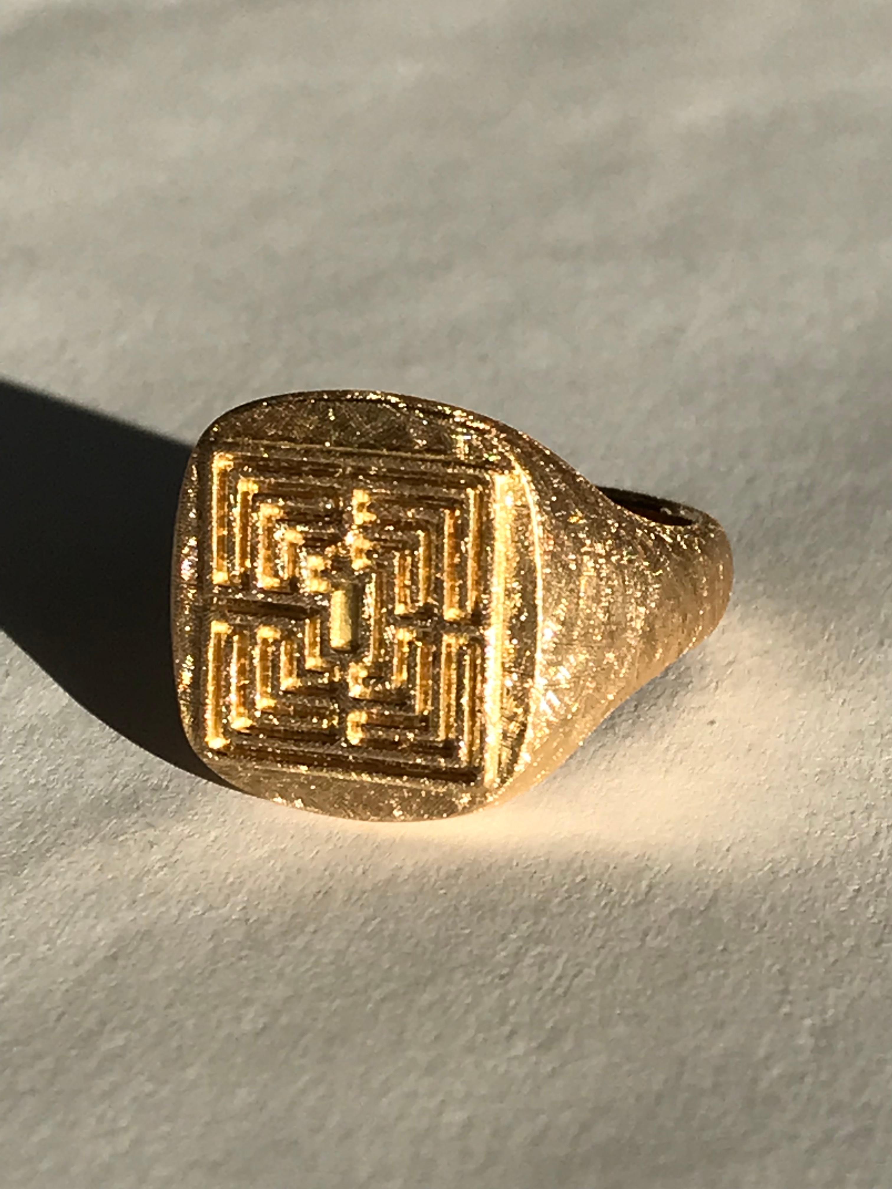 Dalben design 18k solid yellow gold scratch finishing signet ring with a labyrinth engraved . 
Top dimensions :
height 15,5 mm
width 14,5 mm
This ring requires 3-4 weeks from order to be custom-made .
The ring has been designed and handcrafted in