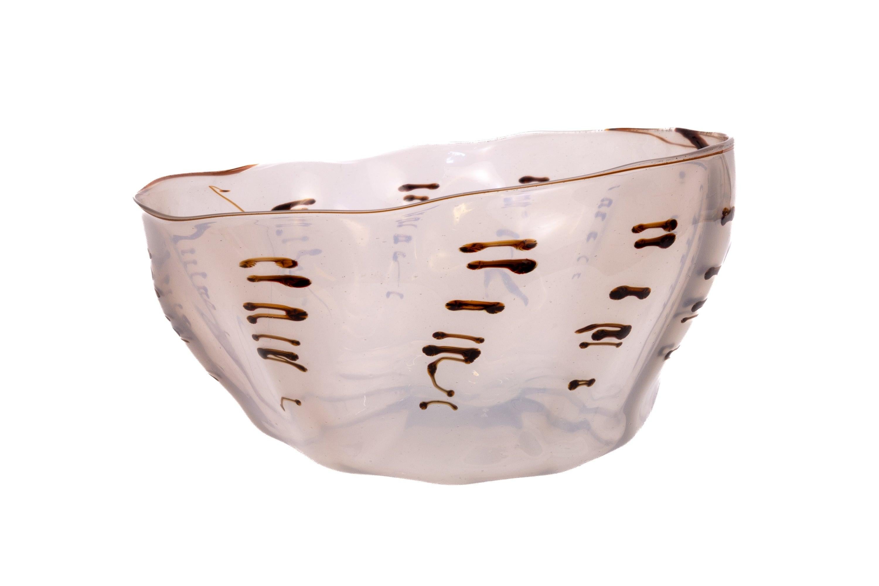 Artist: Dale Chihuly
Title: Tabac Basket with Brown Threads and Lip Wrap
Medium: Hand Blown Glass
Size: 5" x 9.5" x 9.5"
Year: Circa 1970s

Dale Chihuly's Tabac Basket with Brown Threads and Lip Wrap is a quintessential example of the artist's