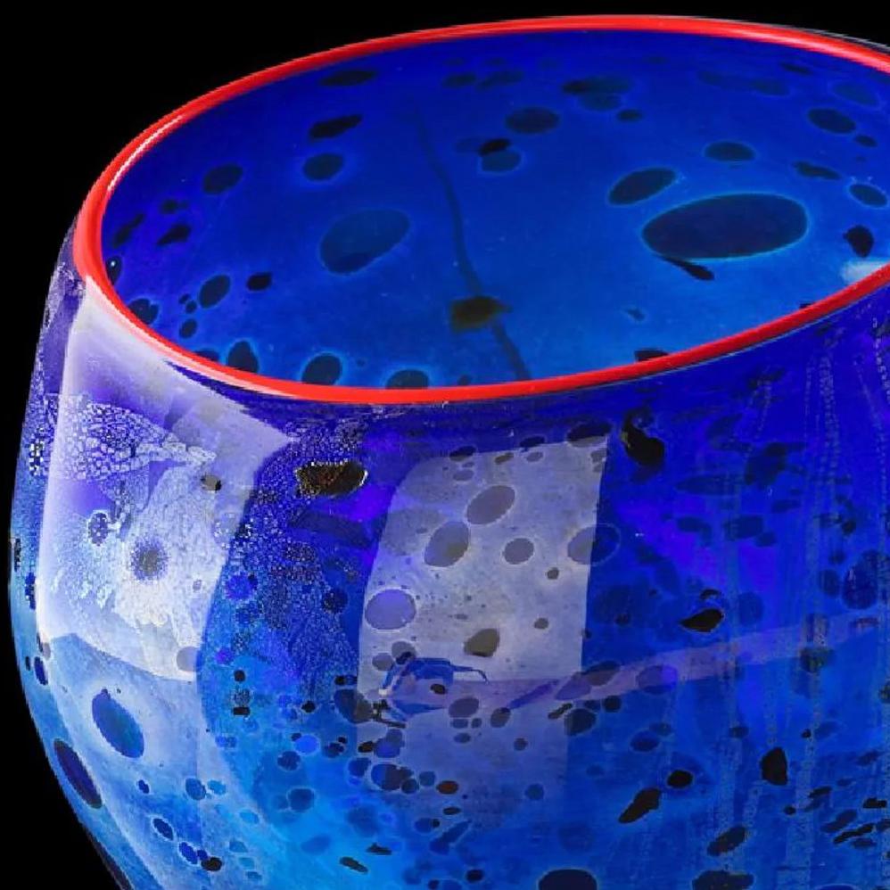 Dale Chihuly - Cobalt Blue Macchia Basket with Cadmium Red Lip Wrap, 1994
Medium: Hand-blown Glass
Signed and inscribed by the artist
Edition: Portland Press 1994
Size: 8 x 9 inches
Acrylic display vitrine included
Certificate of Authenticity