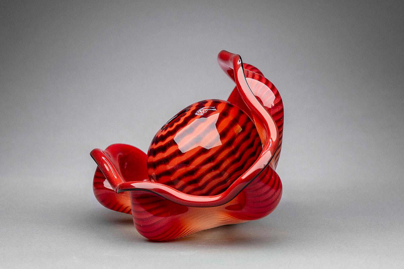 Dale Chihuly – Chinese Red Seaform Pair, 1995
Hand Blown Glass
Size: 3 ¼ x 3 ¾ and 6 x 11 x 7 inches
Signed and dated by the artist
Certificate of Authenticity included

Throughout his rich and prolific career, Dale Chihuly has been searching for