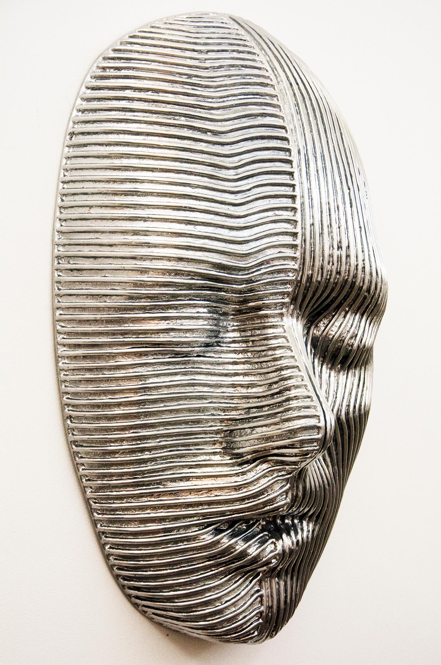 Dichotomy - Large Polished Aluminum Wall Sculpture - Gray Figurative Sculpture by Dale Dunning