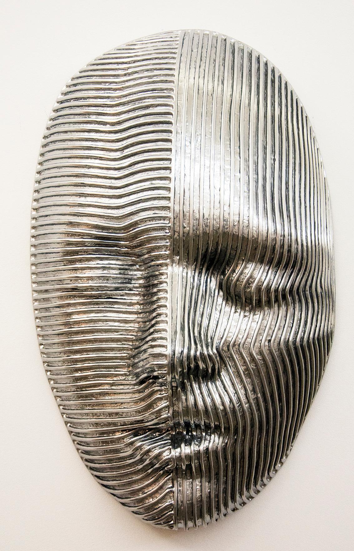 Dale Dunning Figurative Sculpture - Dichotomy - Large Polished Aluminum Wall Sculpture