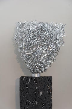 Murmuration - tall, metal, abstracted human face, aluminum sculpture