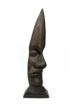 Sentinel - tall, dark, abstract, human face, head, bronze, sculpture