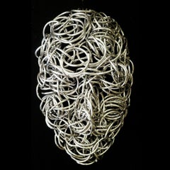 Spring - aluminum, mask, sculpture, wall sculpture