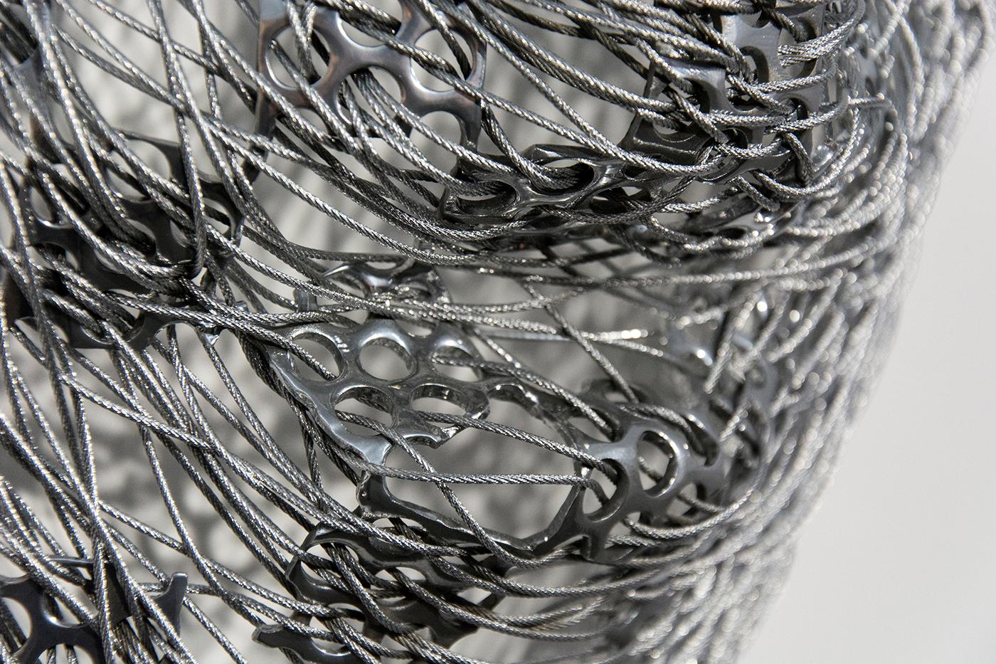 Tangled - silver, abstract human face, stainless steel and cable wall sculpture - Contemporary Sculpture by Dale Dunning